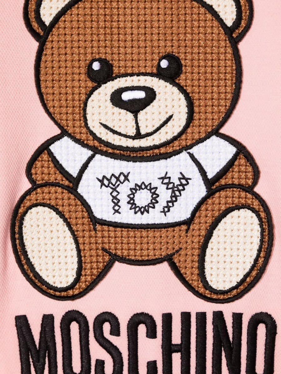 Shop Moschino Baby Grow In Pink