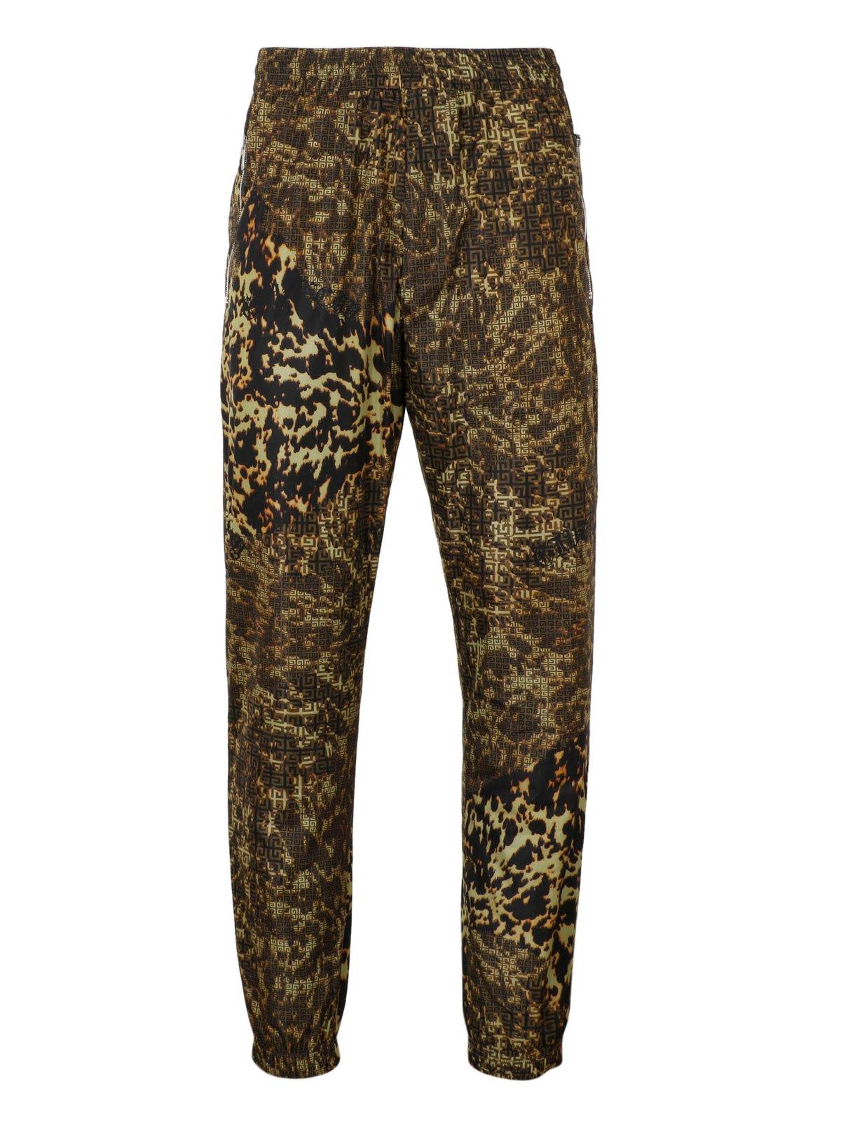 Shop Givenchy 4g Printed Straight Leg Joggers In Green