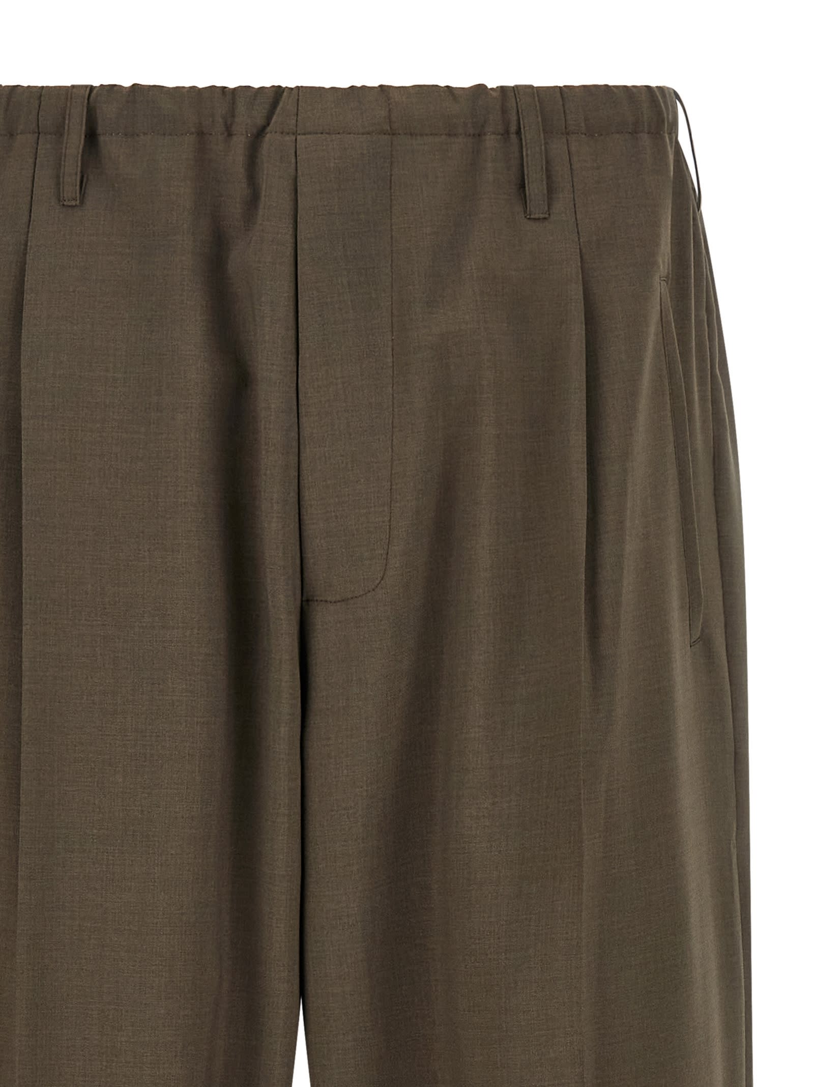 Magliano Elastic Waistband Cuffed Hem Trousers In Brown