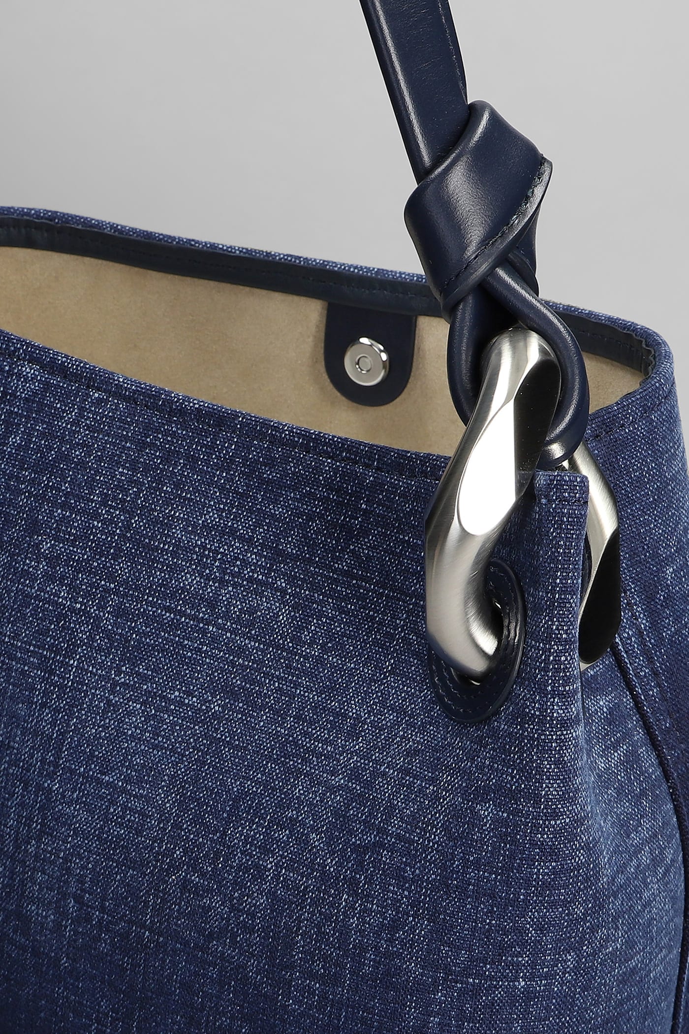 JW ANDERSON CORNER HAND BAG IN BLUE COTTON