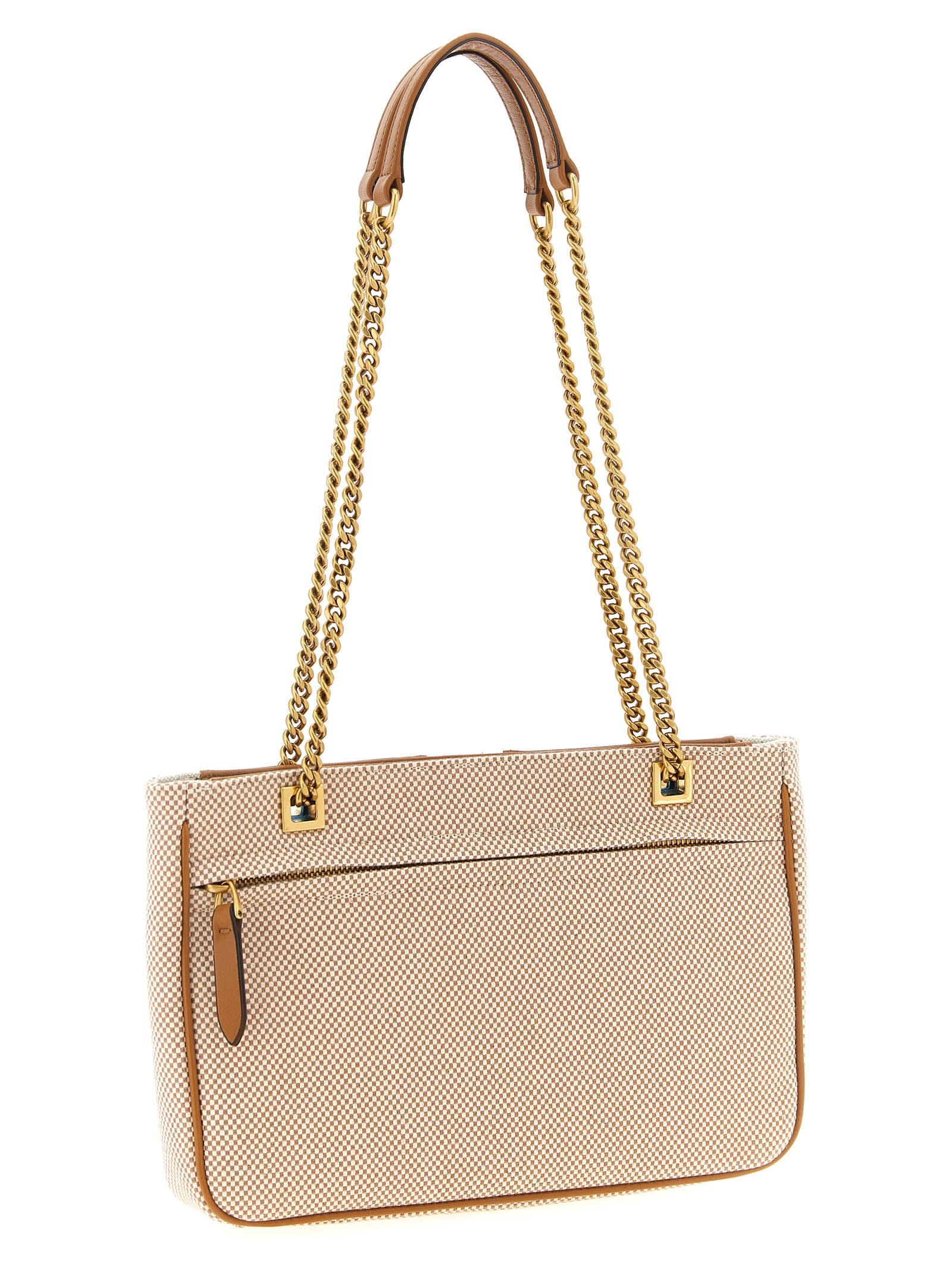 Valentino Garavani Viva Superstar Shoulder Bag In Brown