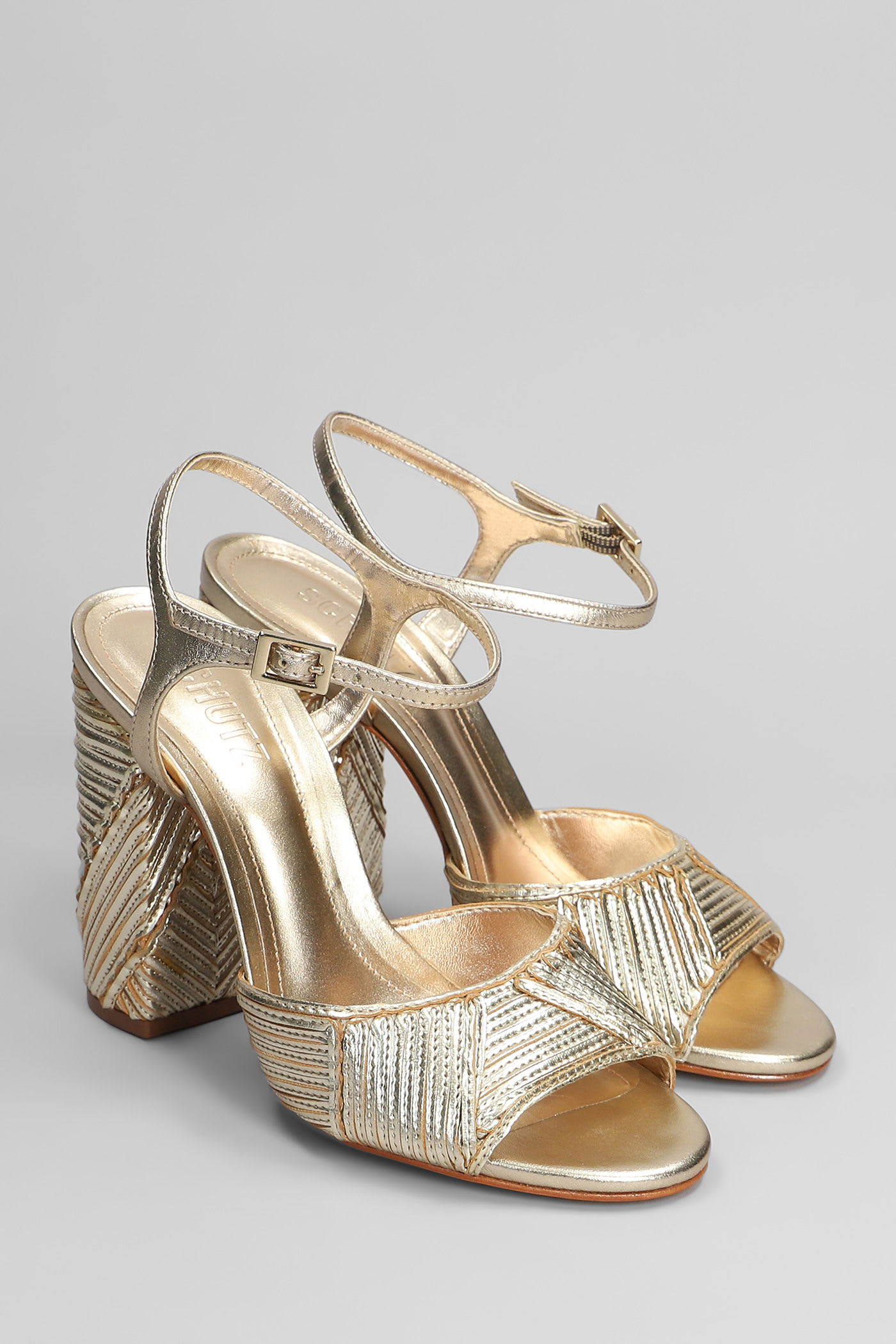 Shop Schutz Lupita Sandals In Gold Leather