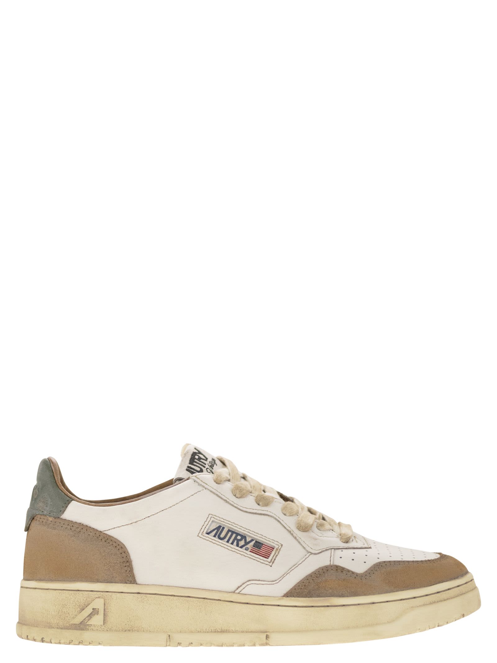 Shop Autry Super Vintage - Leather Sneakers In White/beige