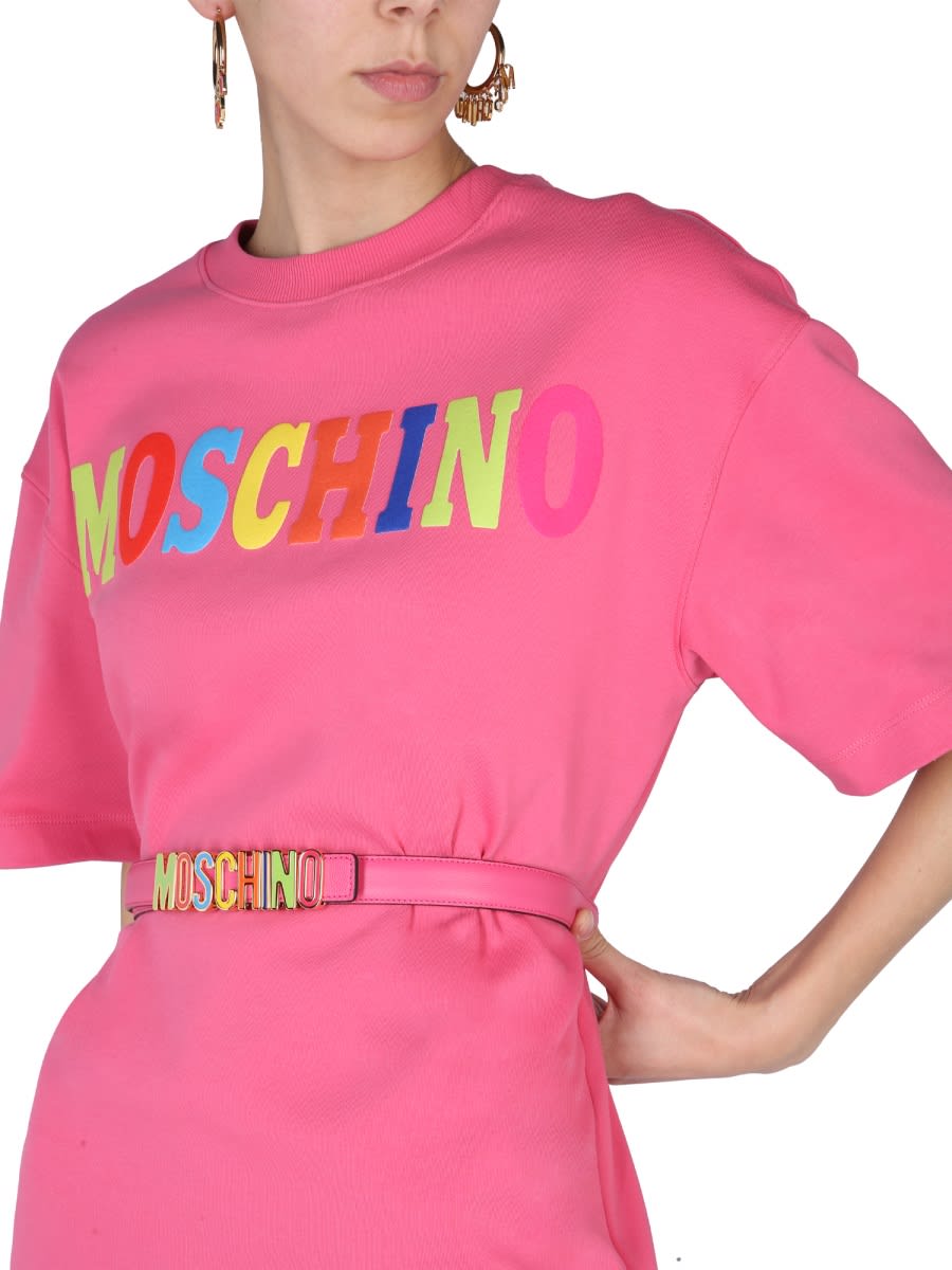 Shop Moschino Flocked Logo Dress In Fuchsia