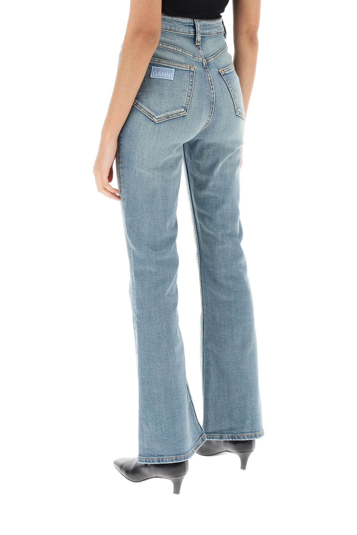 Shop Ganni Bootcut Jeans In Blu Denim Chiaro