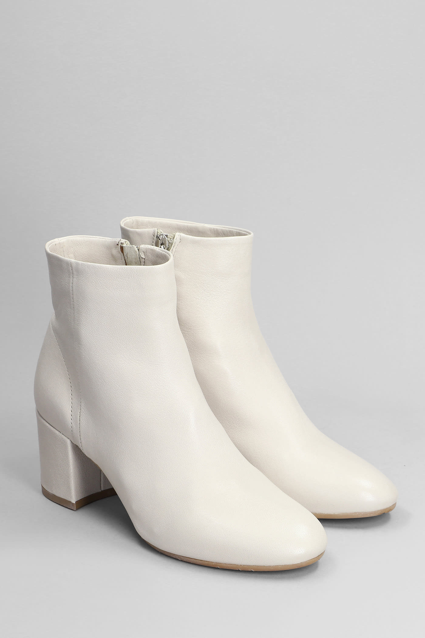Shop Julie Dee High Heels Ankle Boots In White Leather