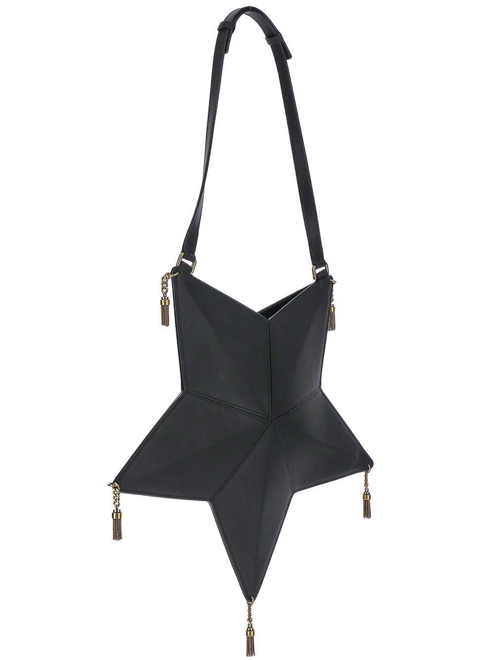 Shop Saint Laurent Astro Shoulder Bag In Vegetable-tanned Leather In Black