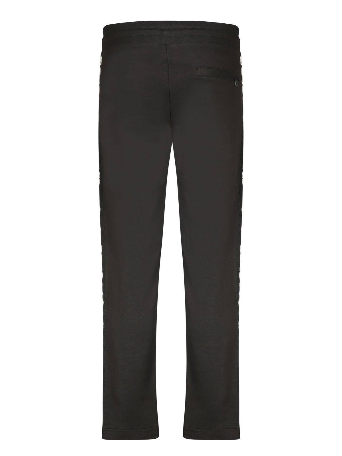 Shop Moncler Logo Printed Drawstring Pants In Black