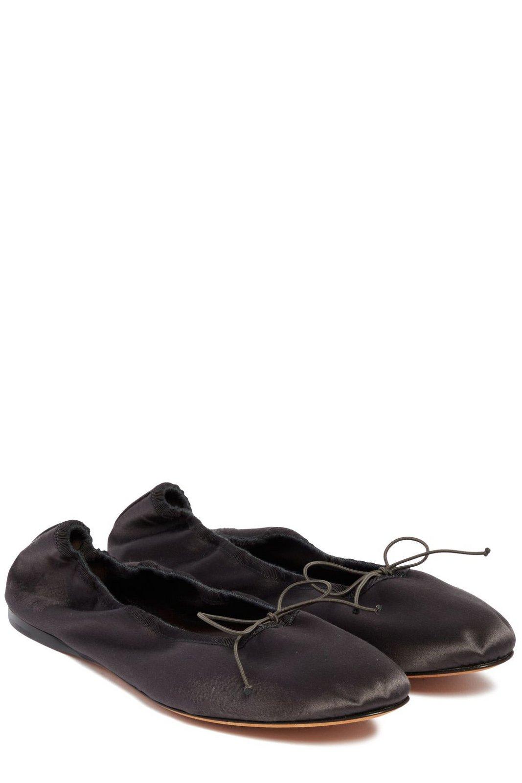 The Row Bow Detailed Slip-on Flat Shoes In Charcoal