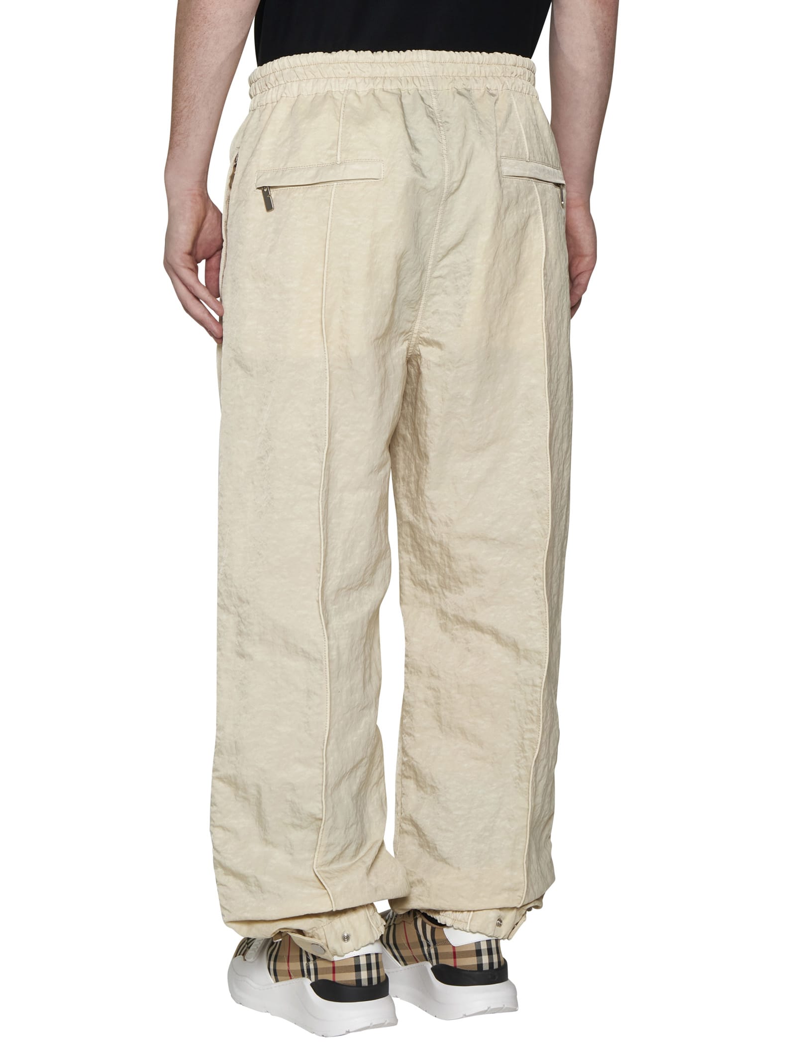 Shop Burberry Pants In Soap