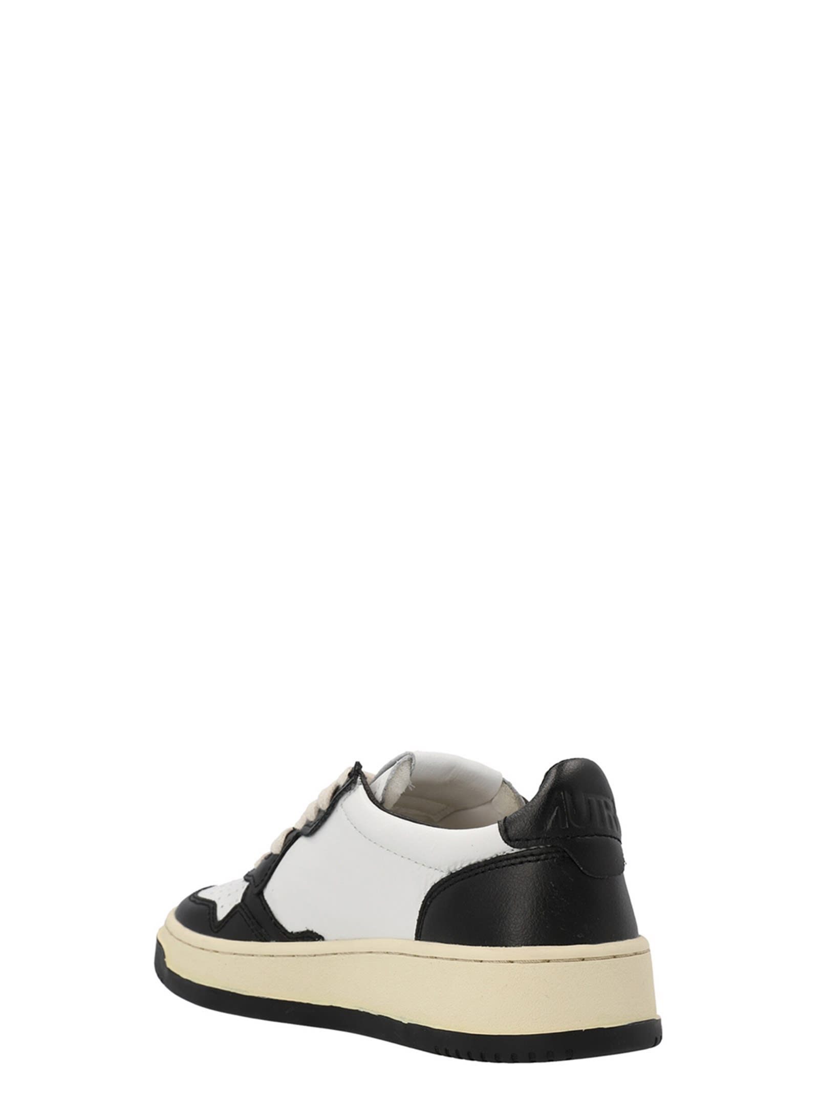 Shop Autry Medalist Low Sneakers In White/black