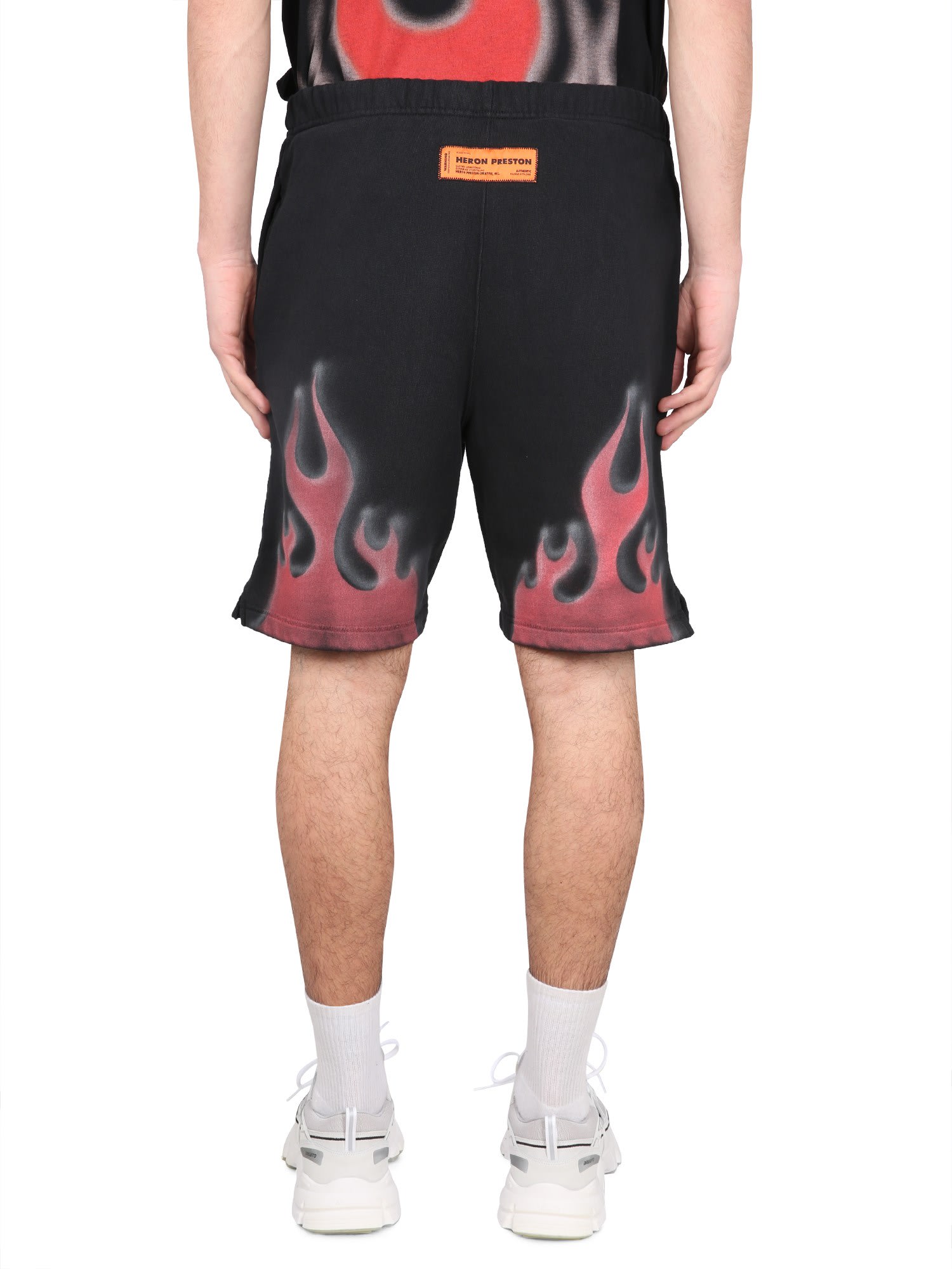 Shop Heron Preston Bermuda Shorts With Flames Print