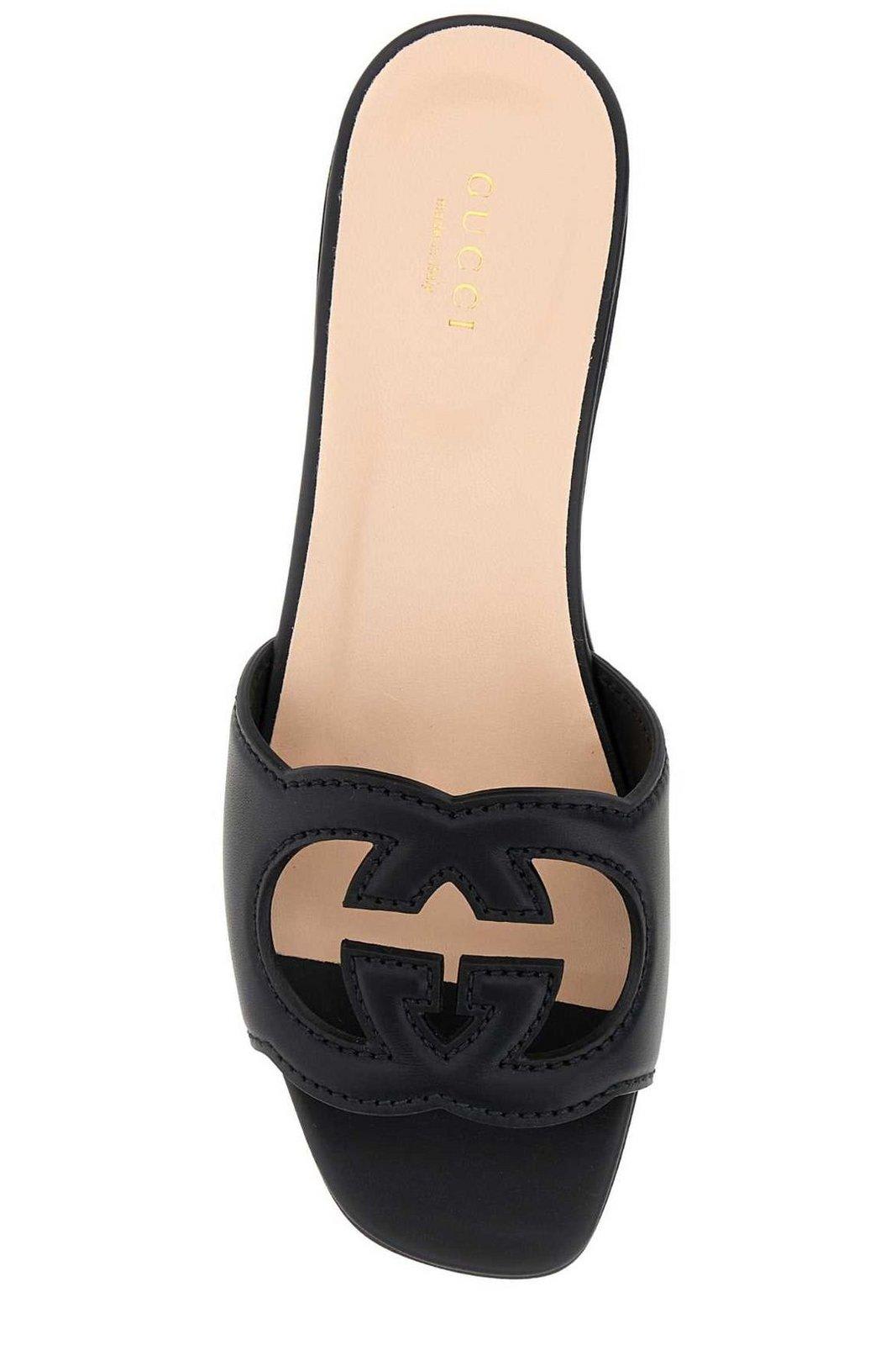 Shop Gucci Logo Cut-out Sandals In Black