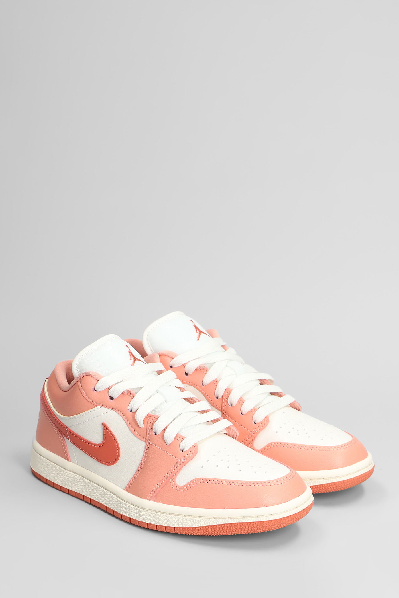 Nike Air Jordan 1 Low Sneakers In White Leather In Pink