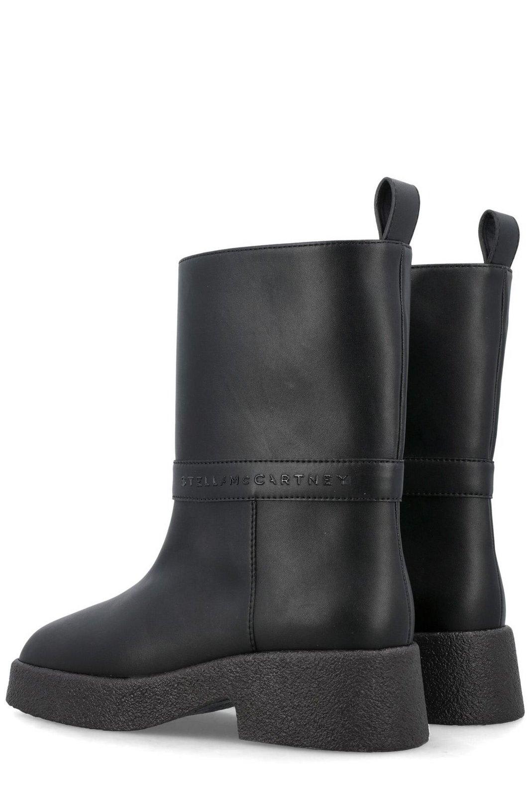 Shop Stella Mccartney Logo Lettering Pull-on Ankle Boots In Black