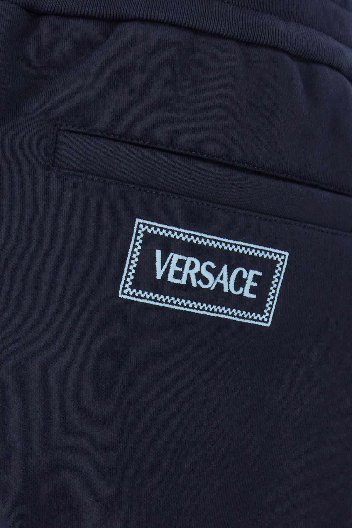 Shop Versace Midnight Blue Cotton Joggers In Navy Blue