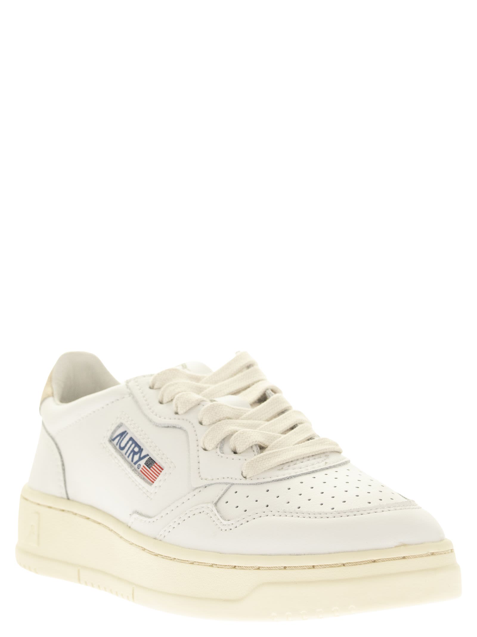 Shop Autry Medalist Low - Leather Sneakers In White/gold