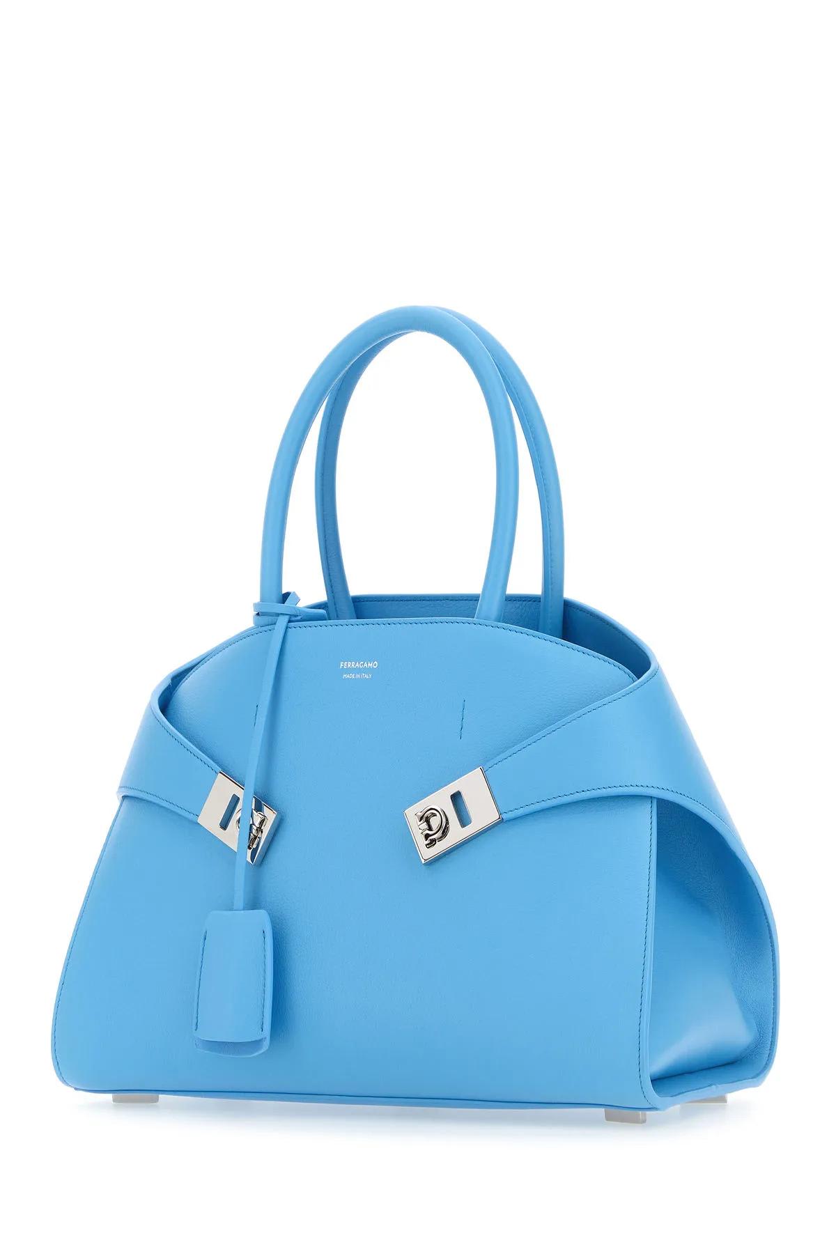 Shop Ferragamo Turquoise Leather Small Hug Handbag In Gnawed Blue