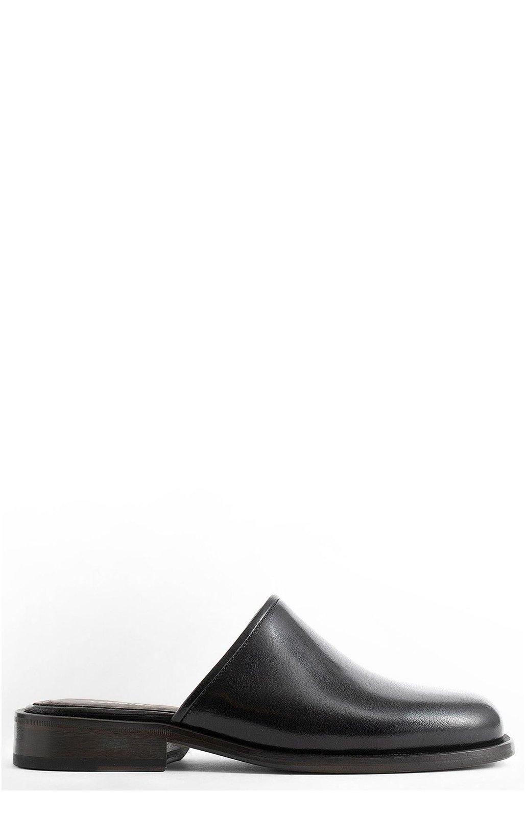 Shop Lemaire Round-toe Slip-on Mules In Black