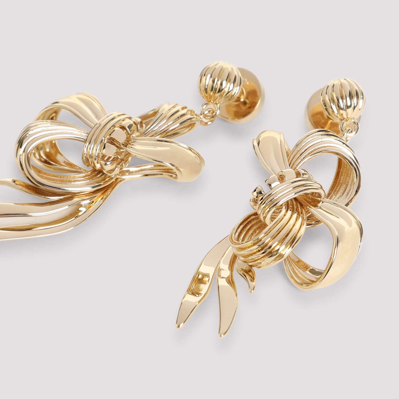 Miu Miu Drop Earrings With Knot Detail And Polish In Gold