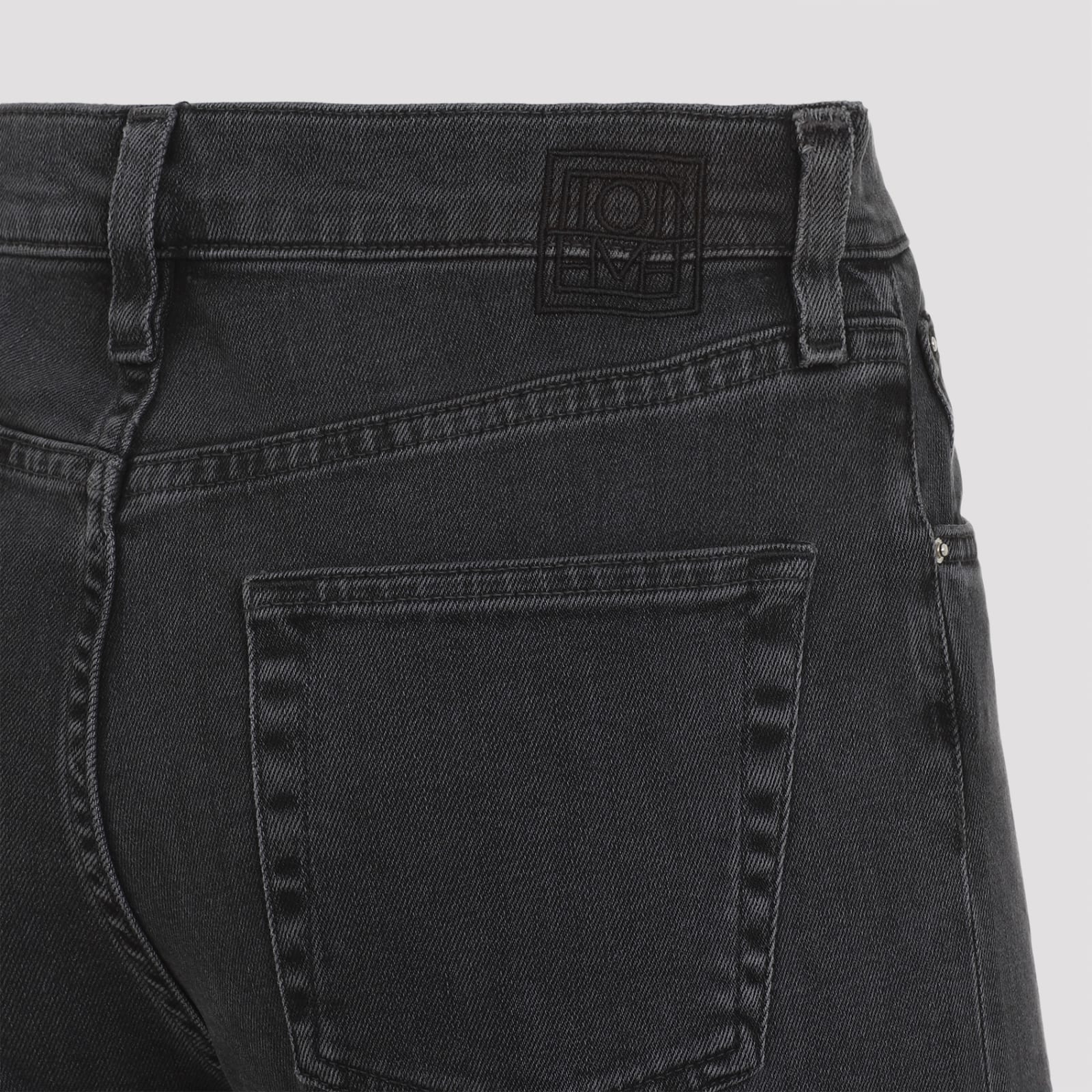 Shop Totême Twisted Seam Jeans In Grey Wash