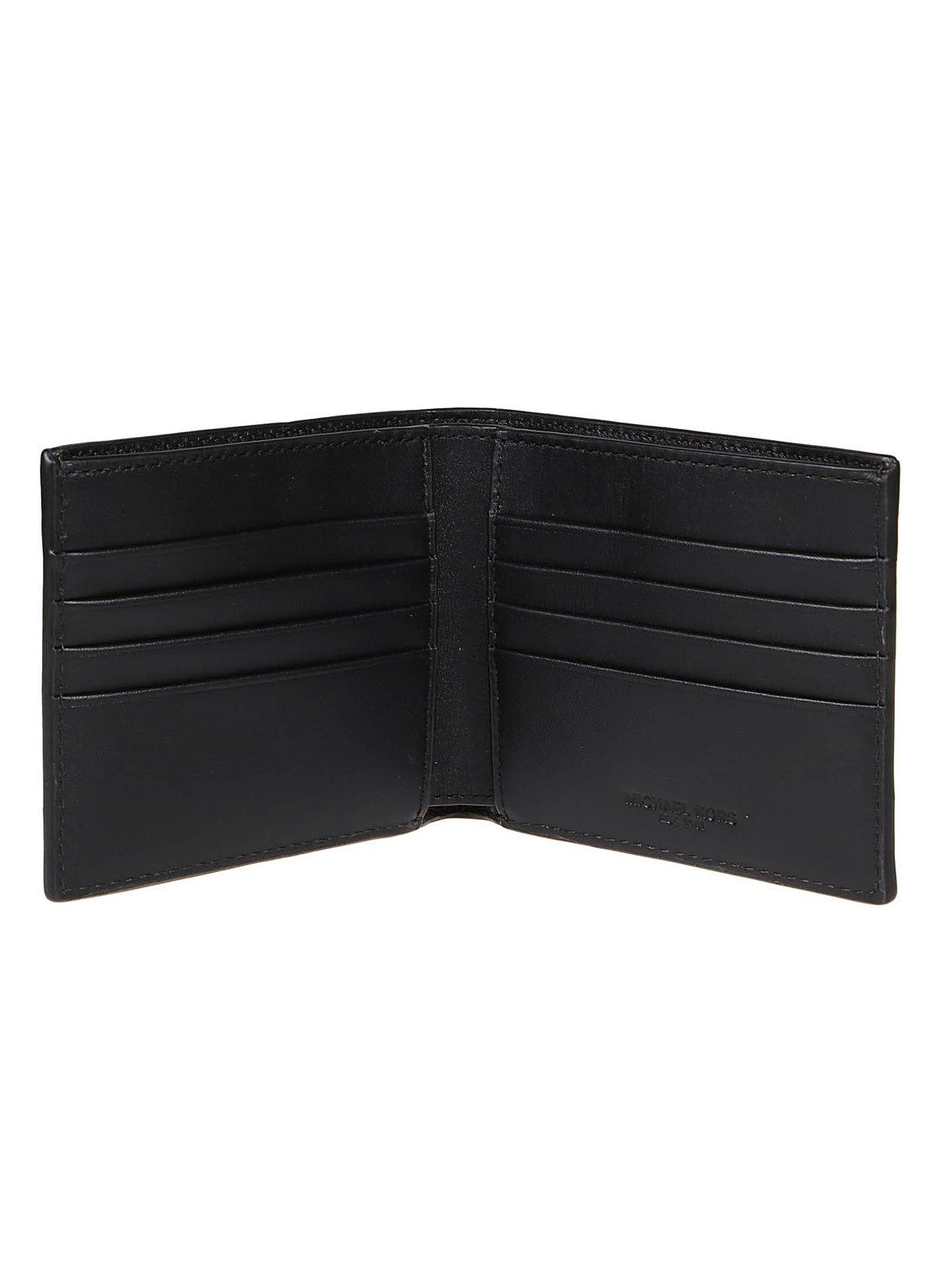 Shop Michael Michael Kors Logo Printed Bi-fold Wallet In Black