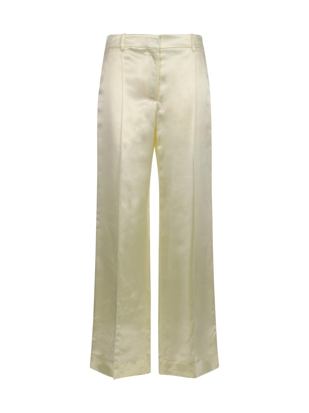 Shop The Row Pleated Encore Pants In Milk