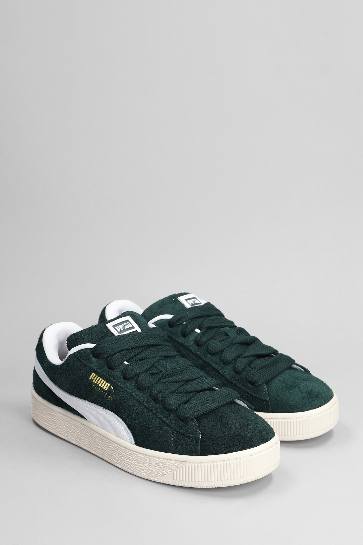 Puma Clyde Low-top Suede Sneakers In Ponderosa Pine Frosted Ivory