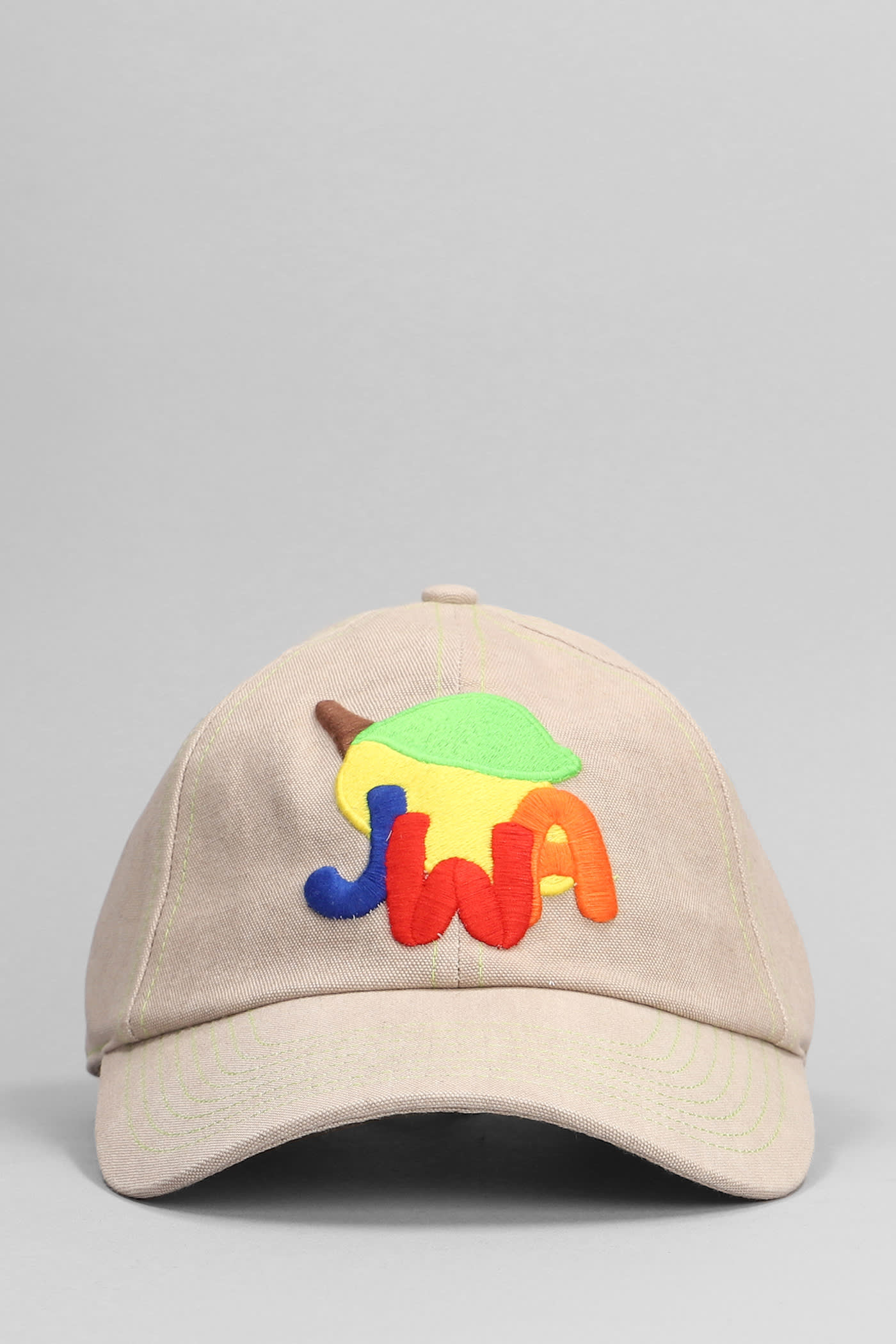 Shop Jw Anderson Hats In Beige Cotton