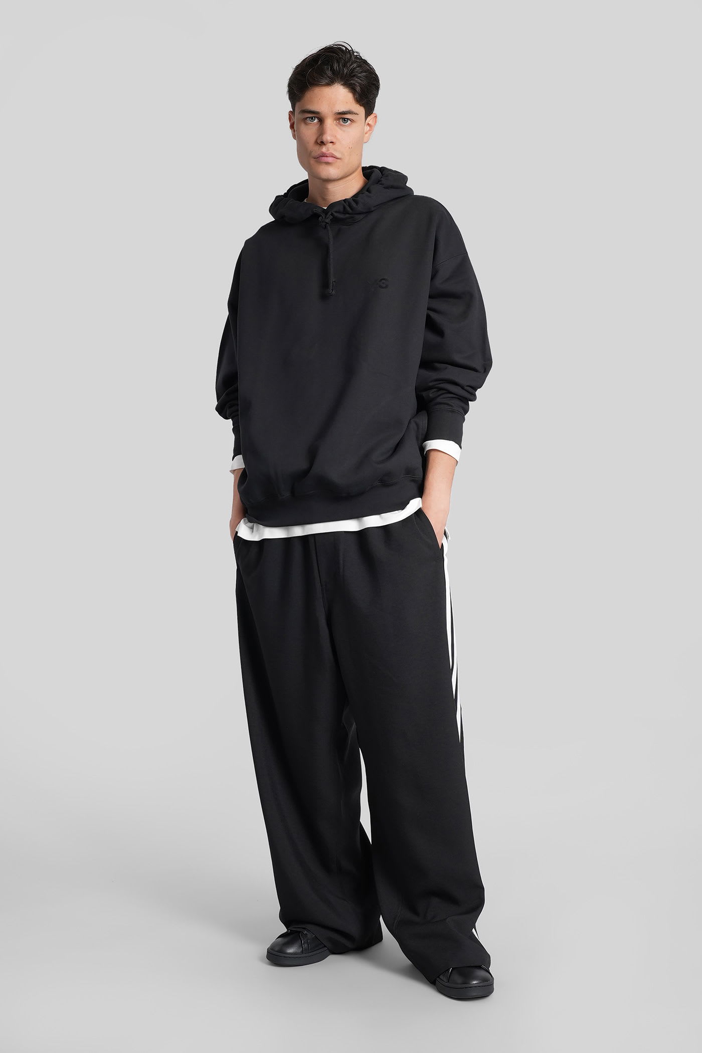 Y-3 Relaxed-fit Black Hoodie With Subtle Front Logo And Side Pockets In Black