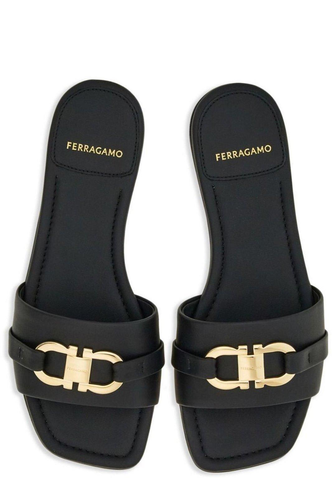 Shop Ferragamo Gancini Plaque Slip-on Slides In Nero