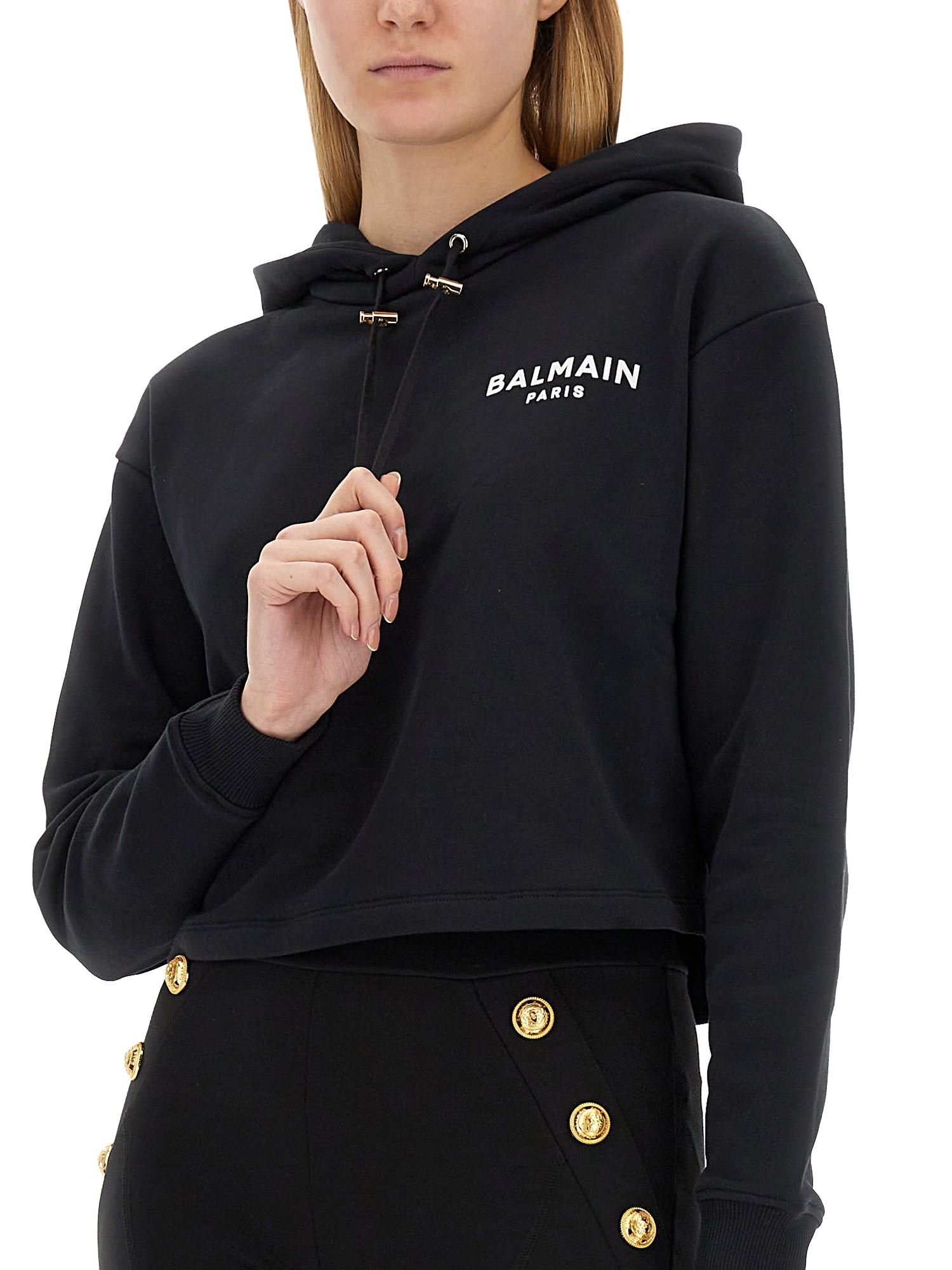 Balmain Cropped Sweatshirt With Flocked Logo Print In Nero