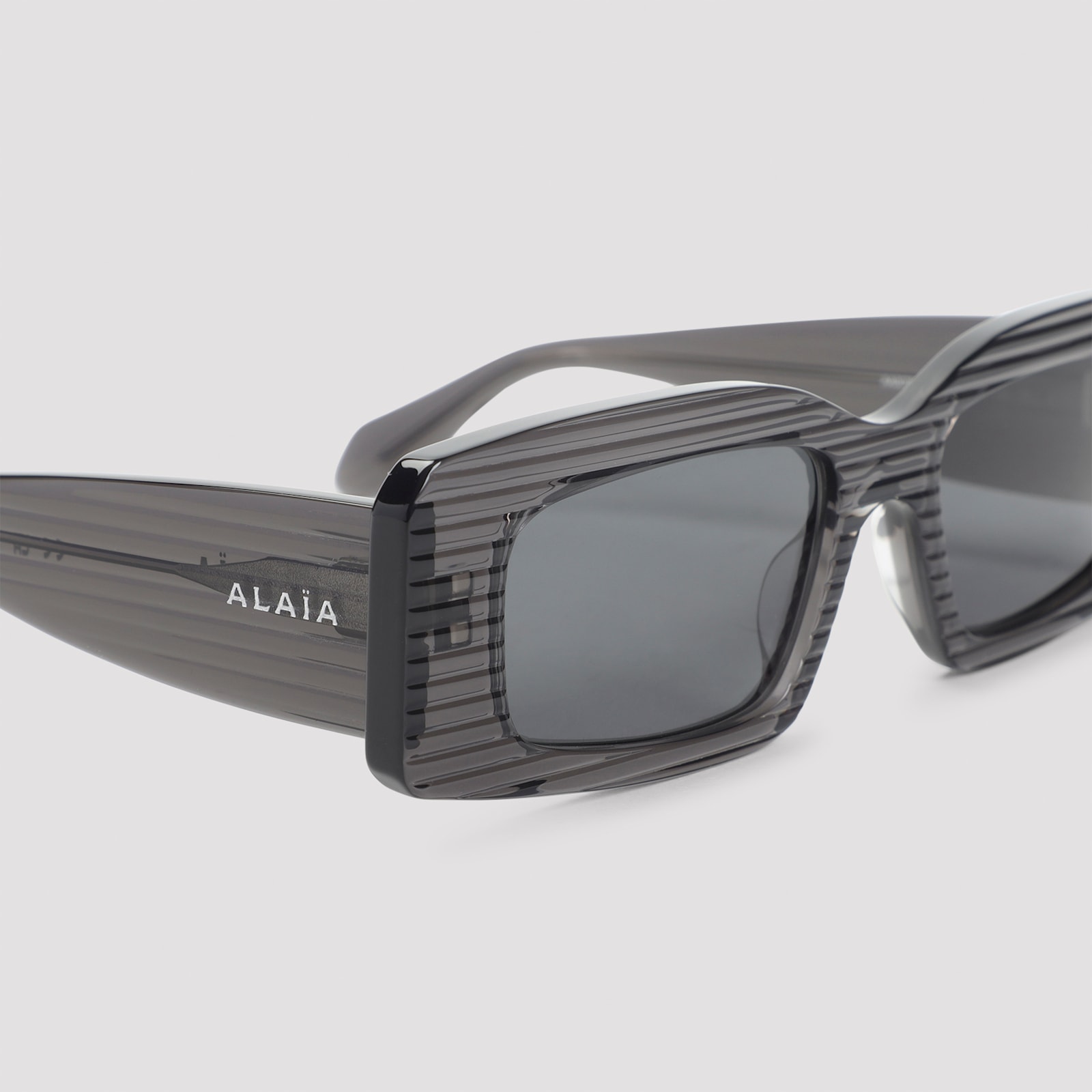 Alaïa Rectangular Frame Sunglasses Striped Pattern In Gray