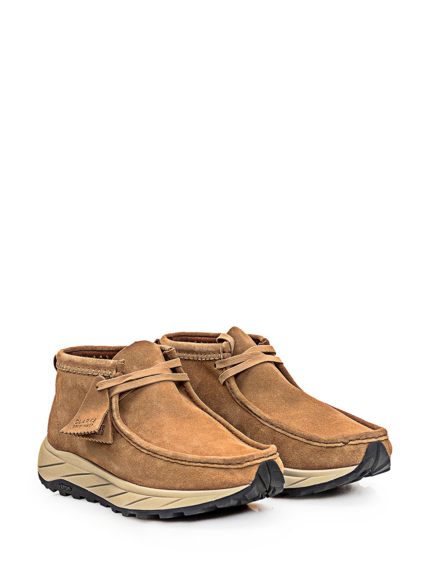 Shop Clarks Wallabee Boots In Brown