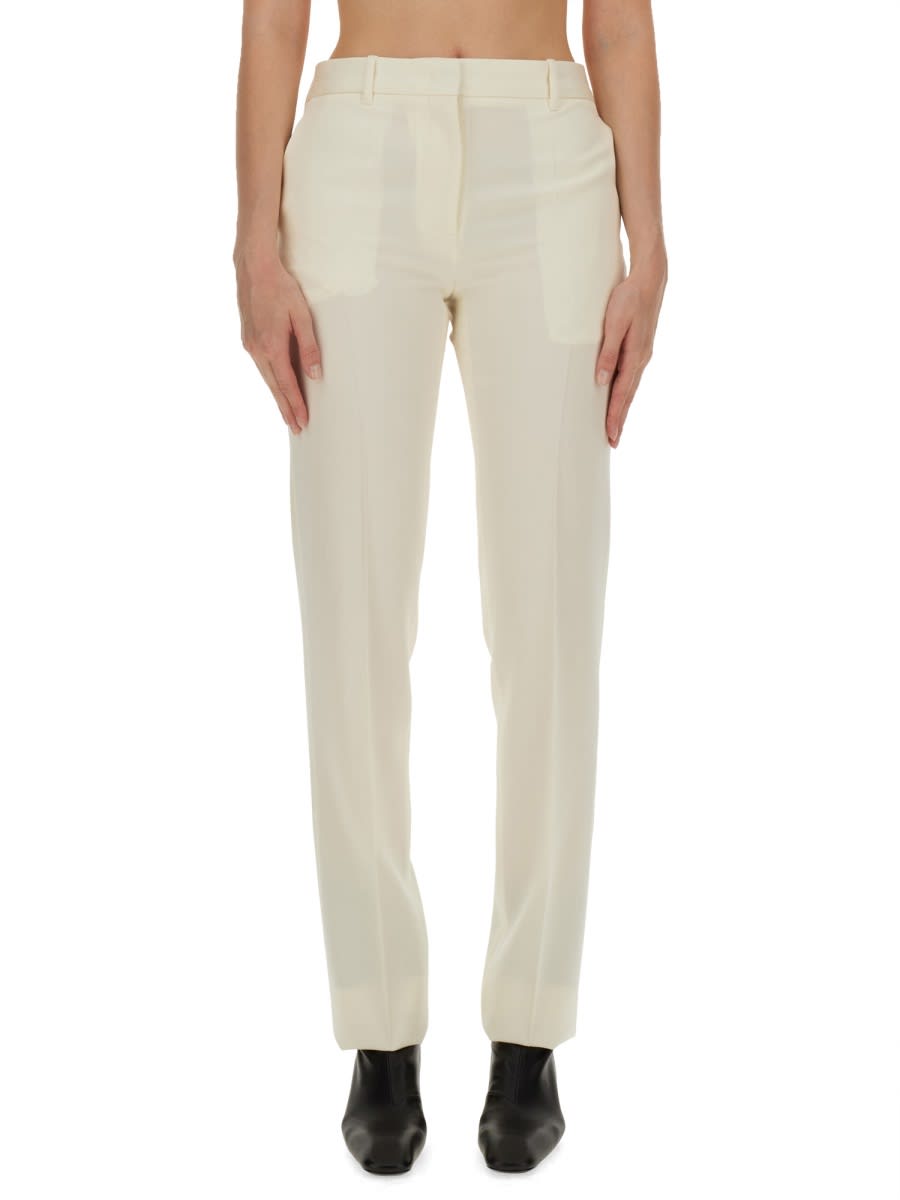 Shop Jil Sander Wool Pants In Powder