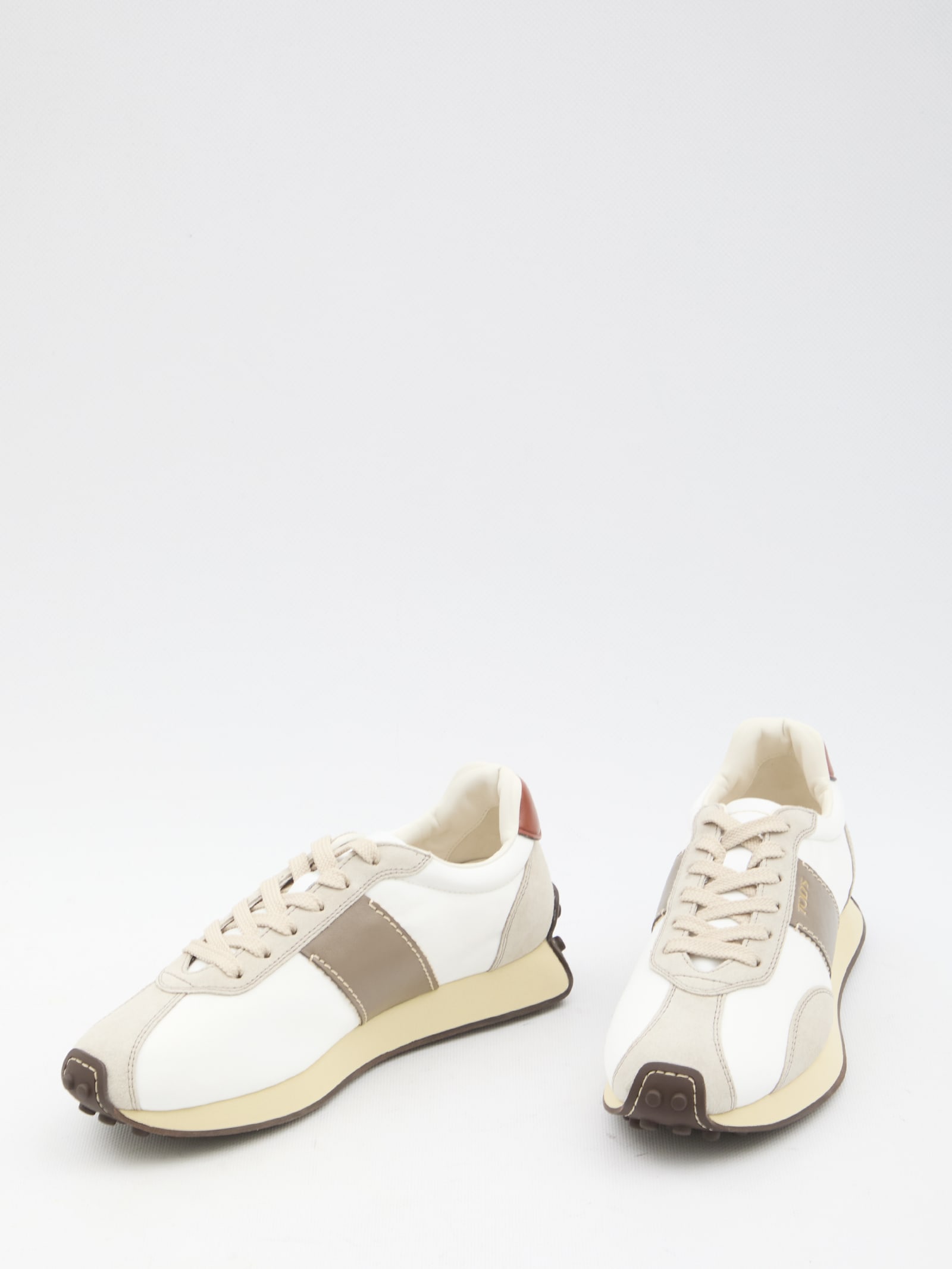 Shop Tod's Sneakers In Leather And Technical Fabric In White