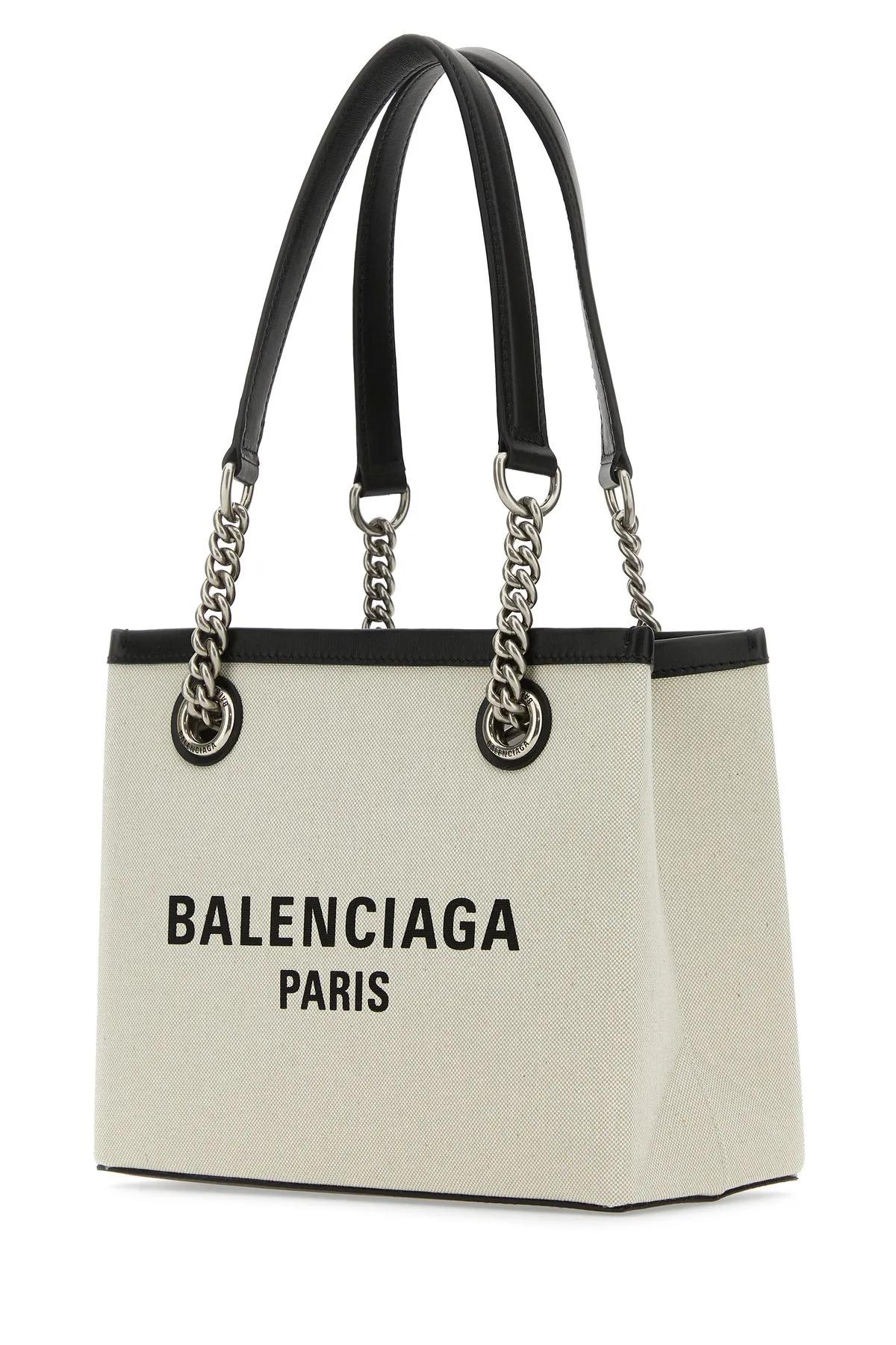 Shop Balenciaga Ivory Canvas S Duty Free Shopping Bag In Beige