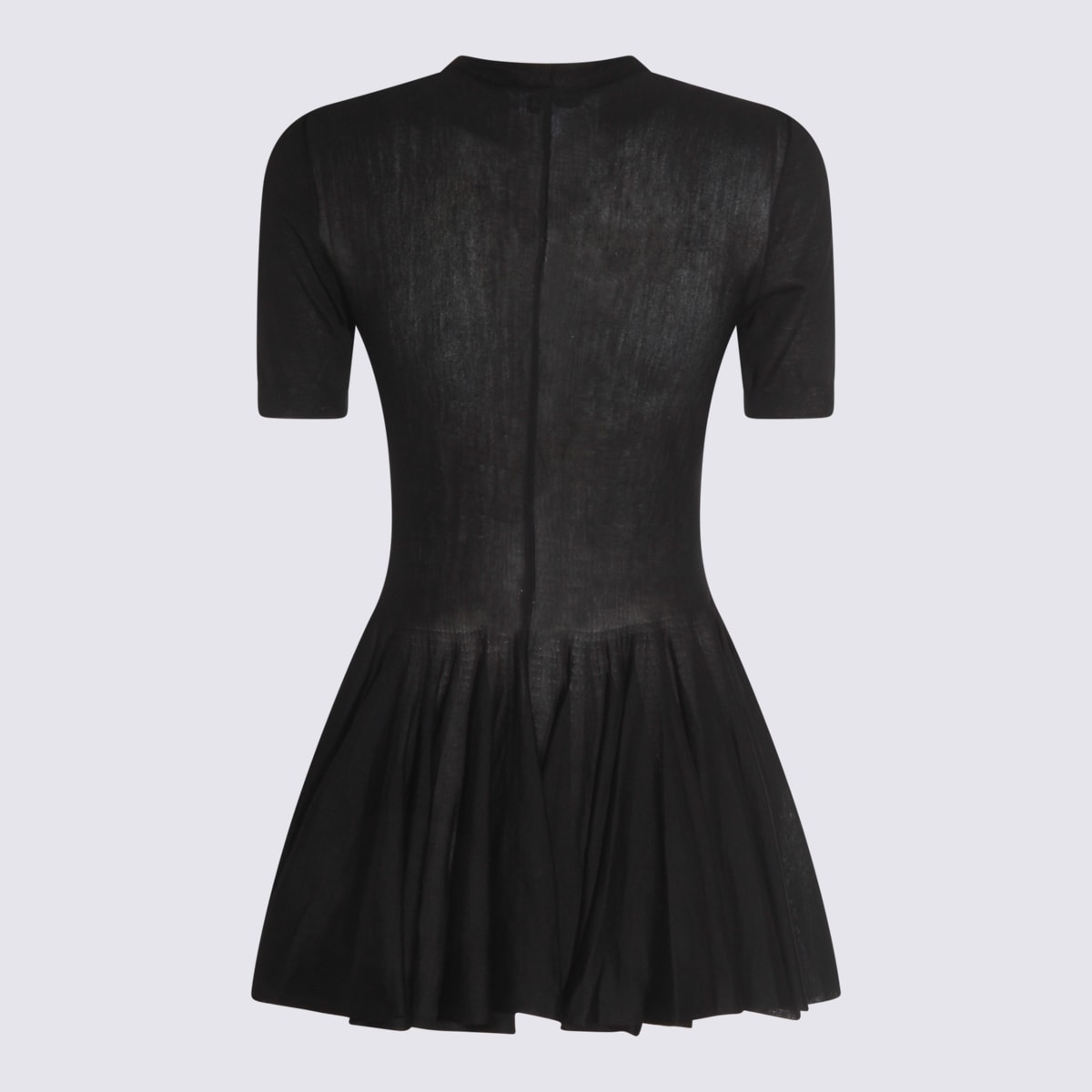Alaïa Ultra Fine Wool Merino Peplum Top Clothing In Black