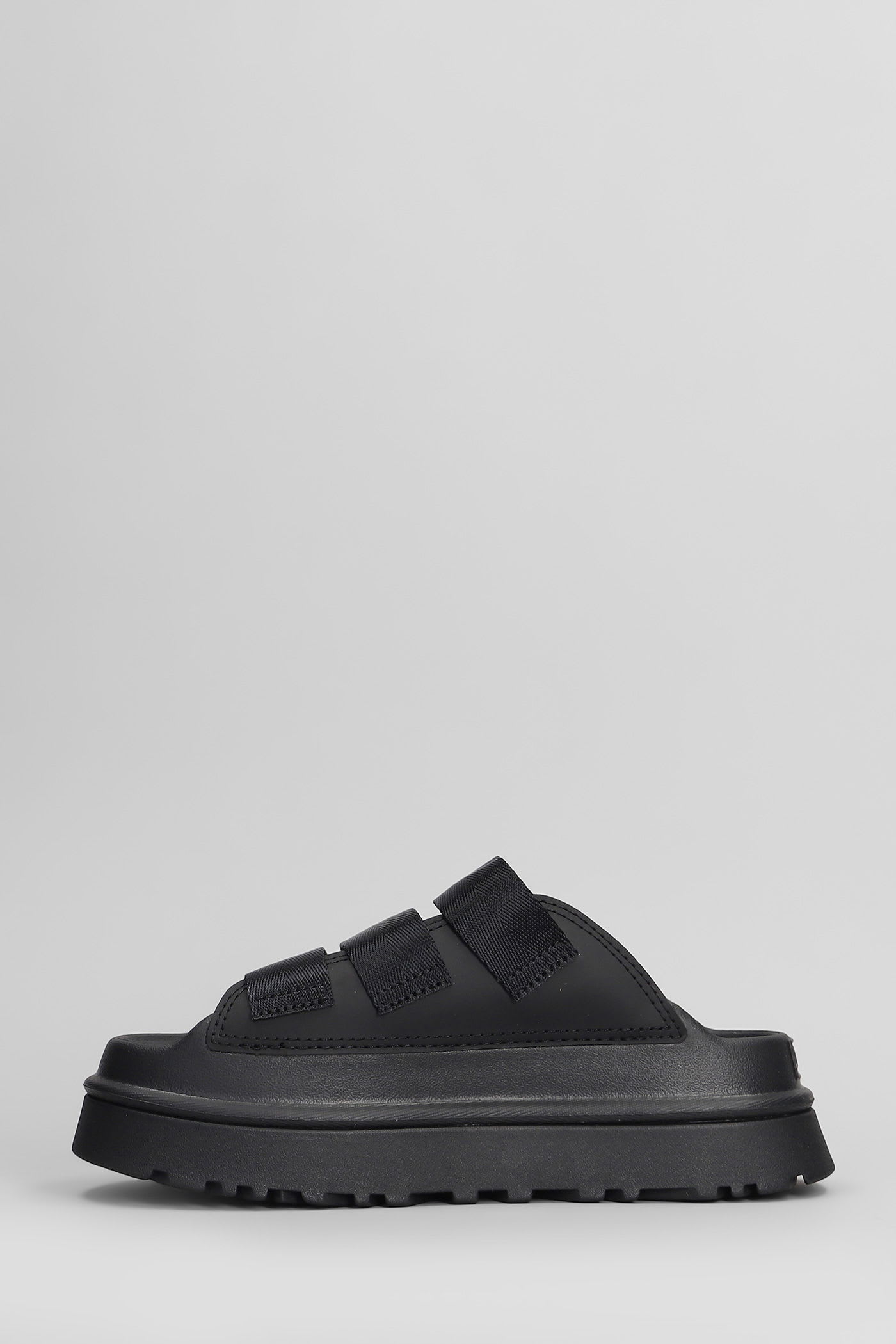 UGG GOLDENGLOW SLIPPER-MULE IN BLACK RUBBER/PLASIC