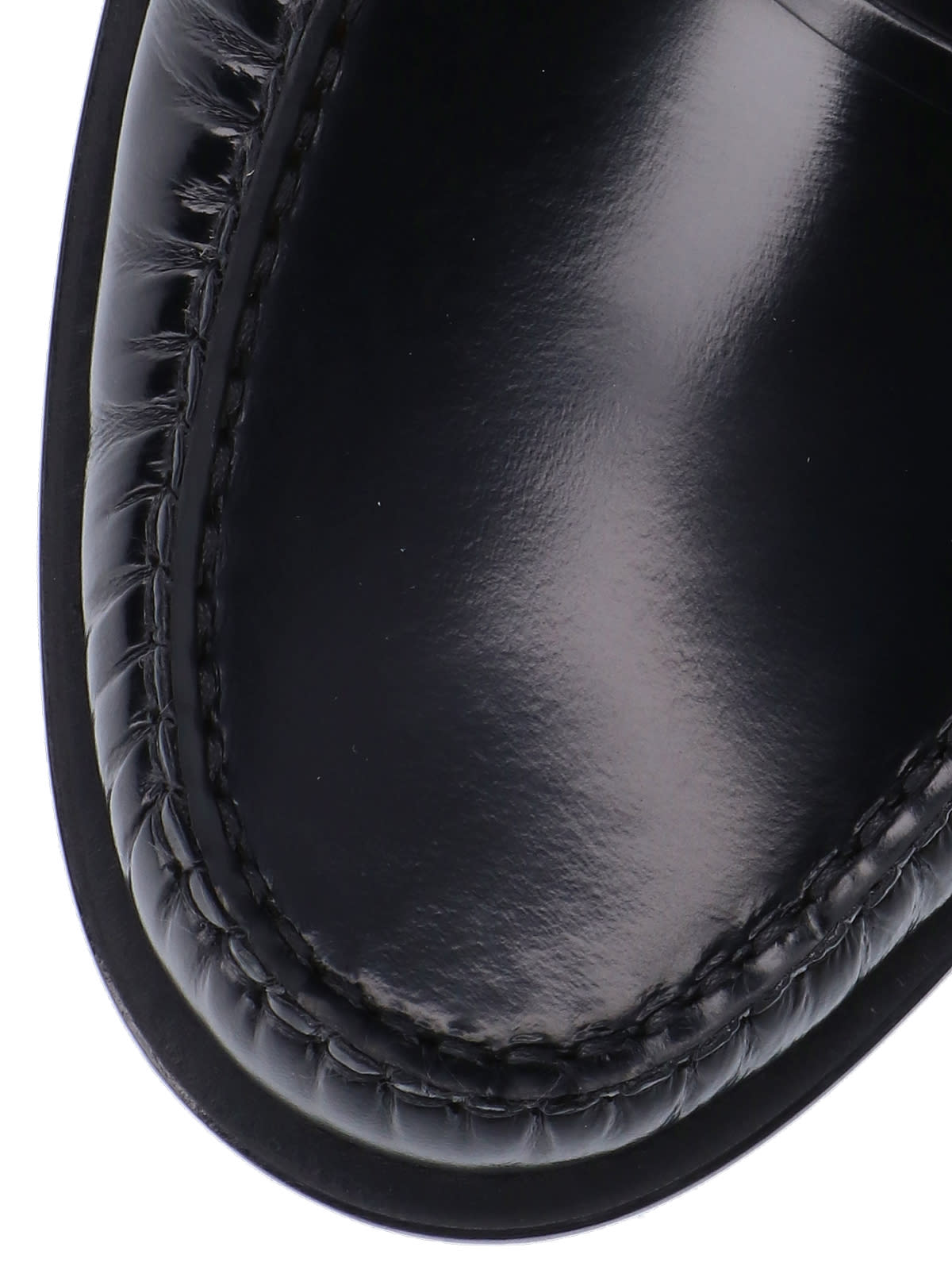 Shop Ferragamo Embossed Logo Loafers In Black