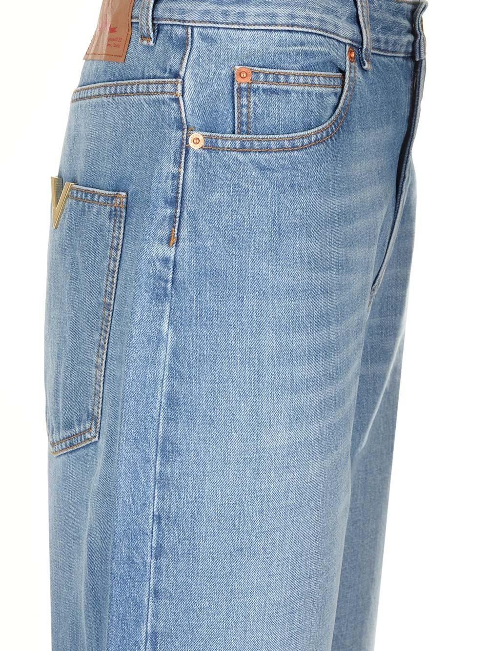 Shop Valentino Logo Patch Wide Leg Jeans In Blu