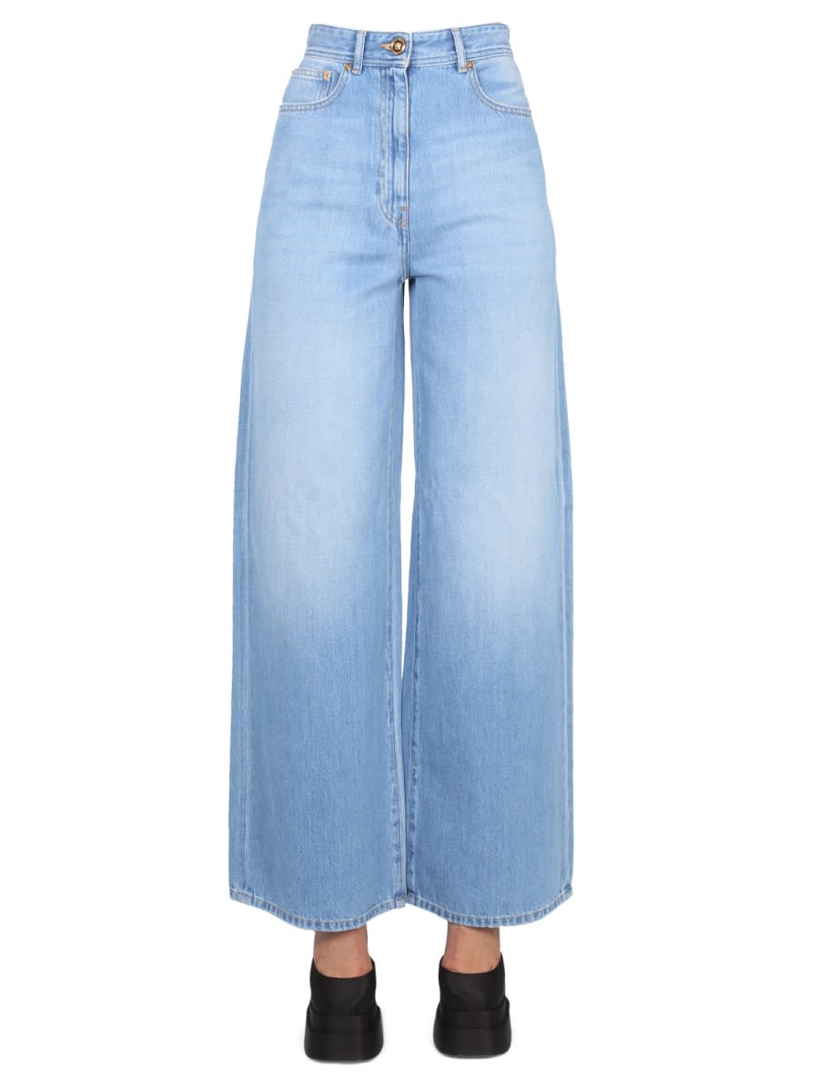 Shop Versace Medusa Wide Leg Jeans In Blue