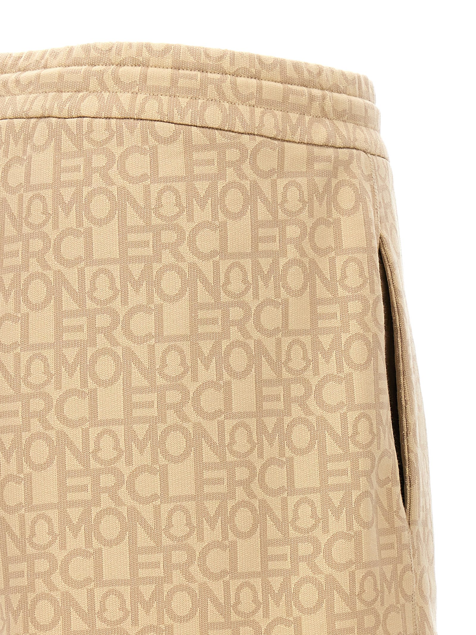 Shop Moncler All Over Logo Bermuda Shorts In Beige