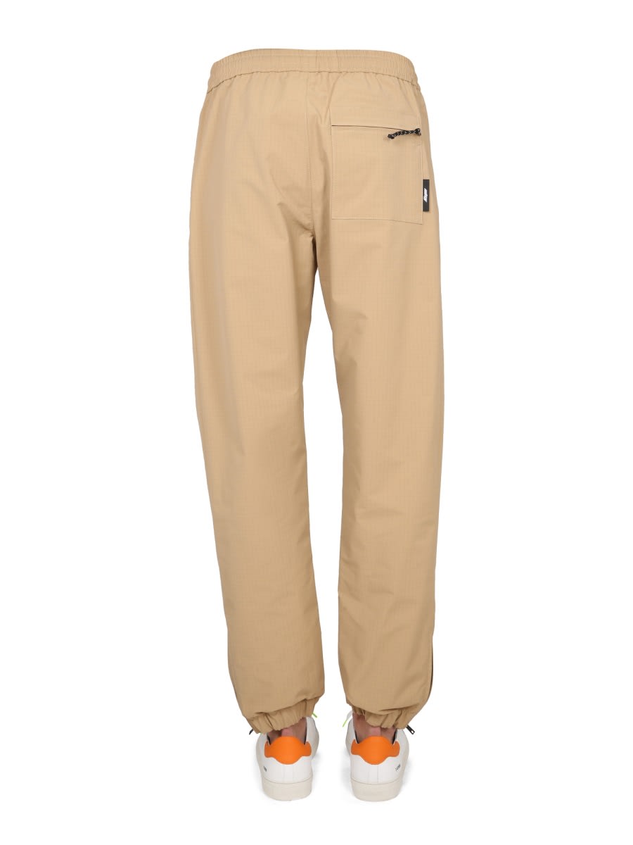 Msgm Logo-print Elasticated Waist Trousers In Beige