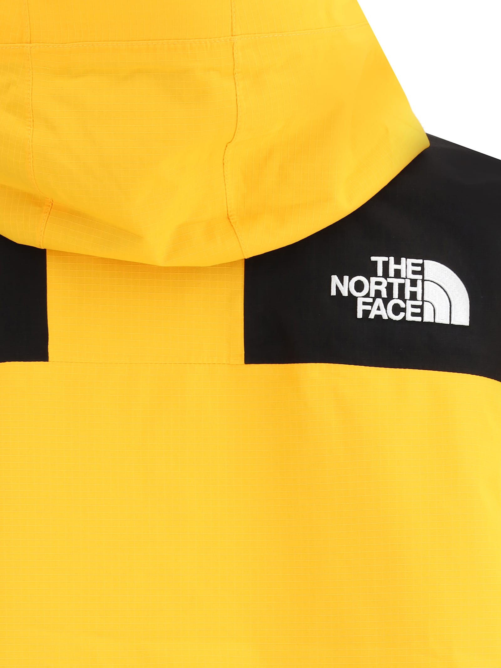 The North Face Windbreaker Jacket With Drawstring And Hood In Yellow