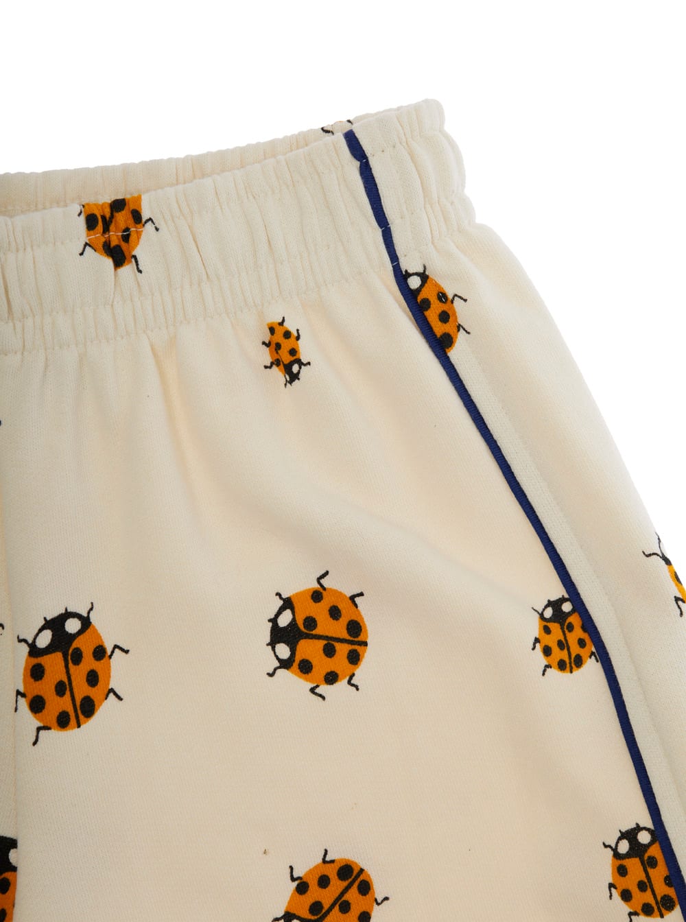 MINI RODINI WHITE SHORTS WITH ELASTIC WAIST AND ALL-OVER LADYBUG EMBROIDERY IN COTTON GIRL