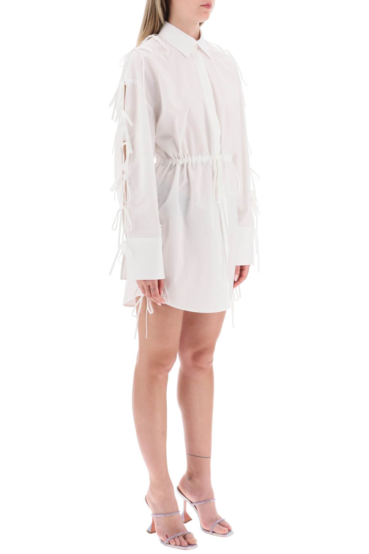 Shop Msgm Mini Shirt Dress With Cut-outs And Bows In Bianco (white)