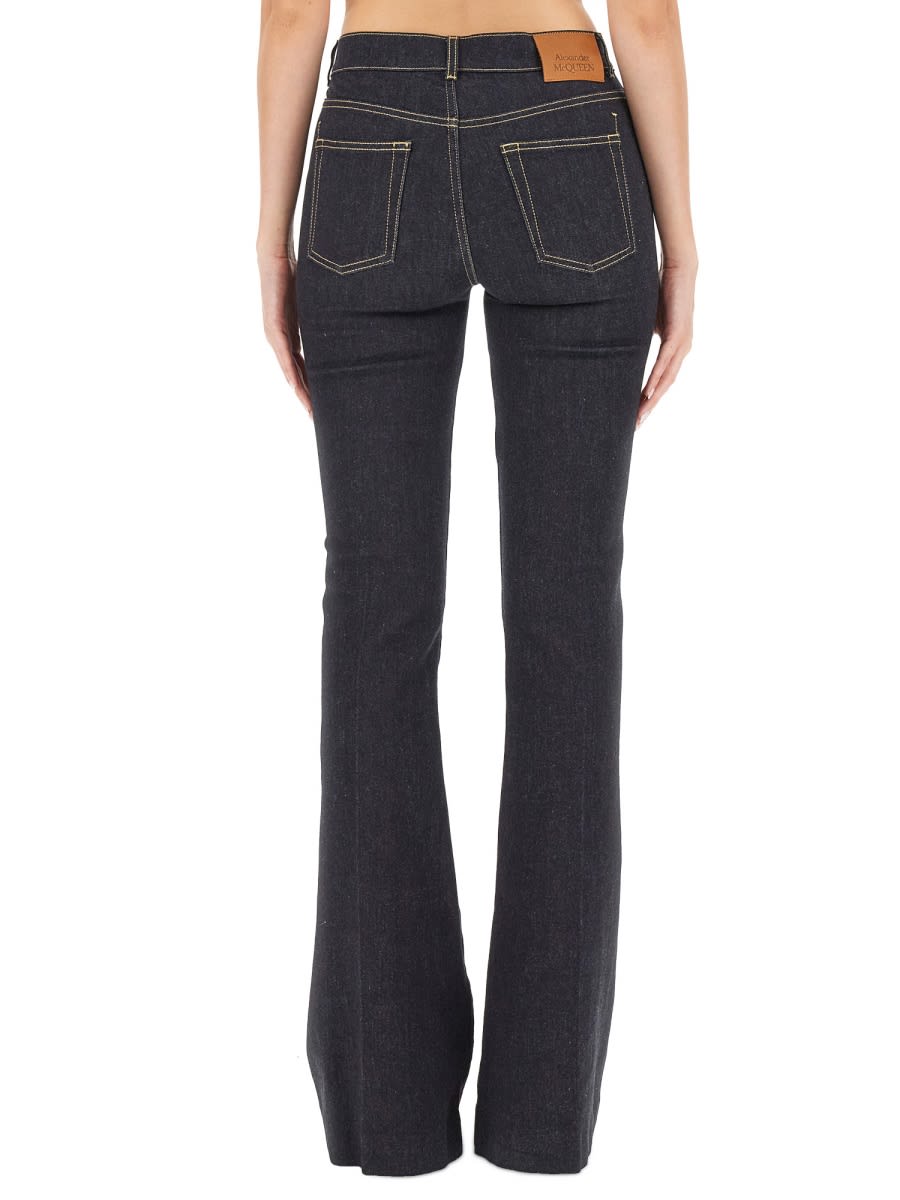 Shop Alexander Mcqueen Jeans Boot Cut In Denim