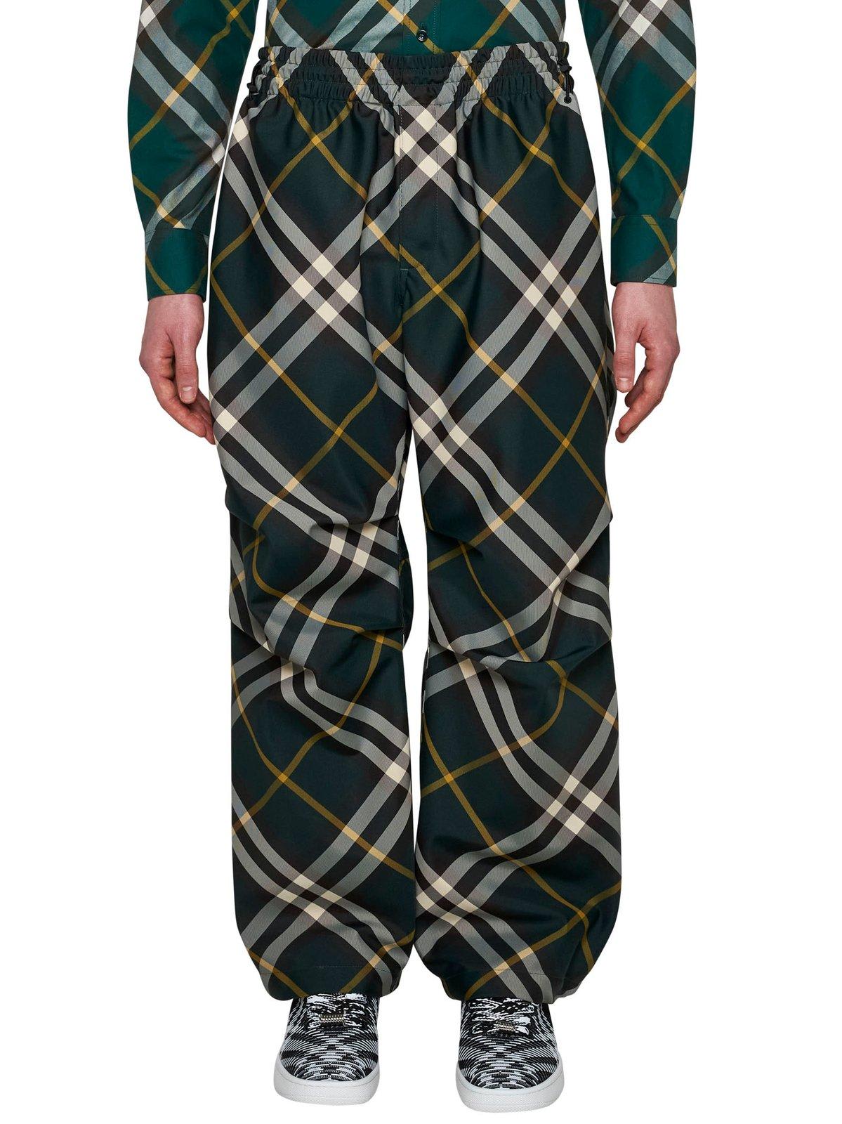 Shop Burberry Wide-leg Equestrian Knight Motif Checked Trousers In Green