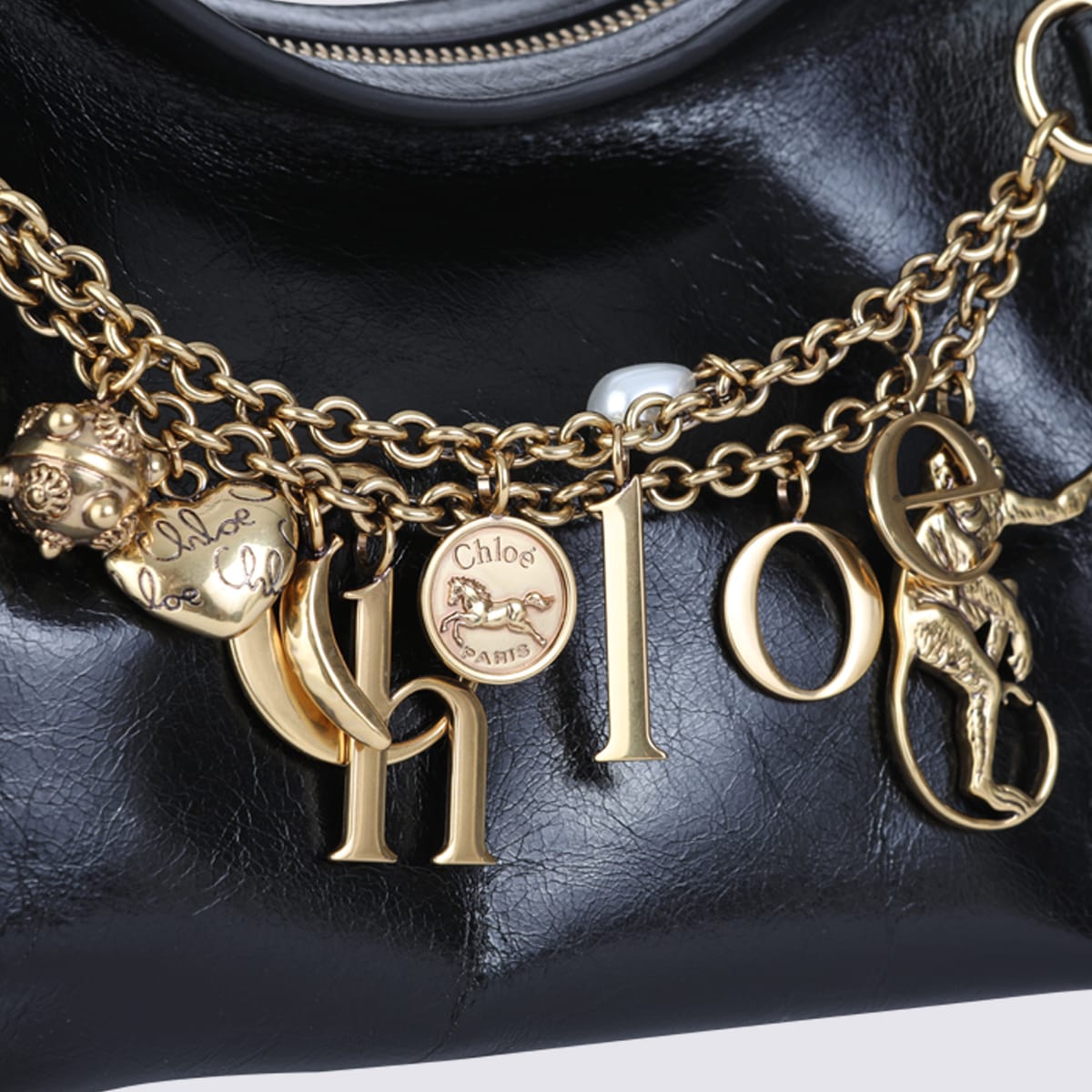 Chloé Leather Shoulder Bag Adorned With Charms In Black